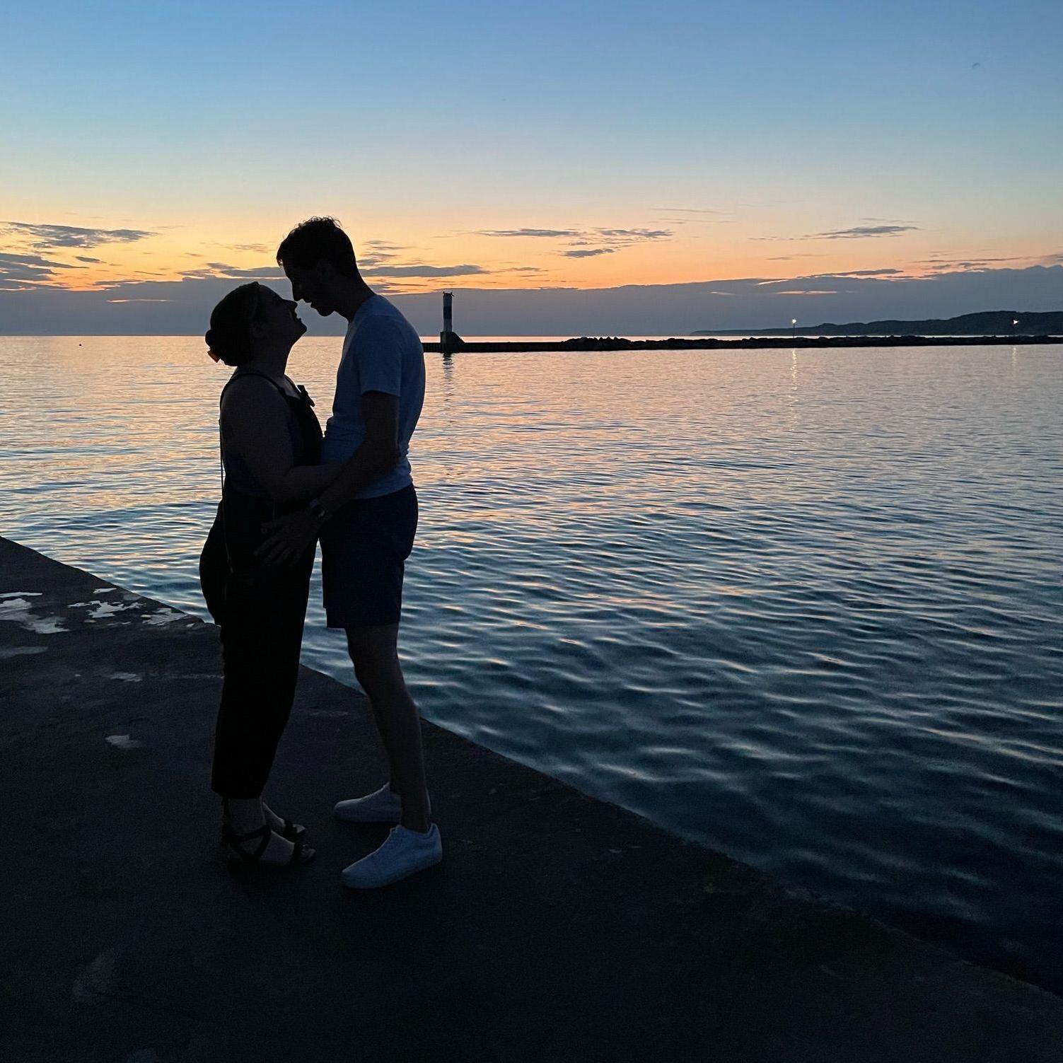 Meet me in Muskegon! Despite Matt's distaste for Michigan, these two love a good sunset on the lake (and posing for the camera).