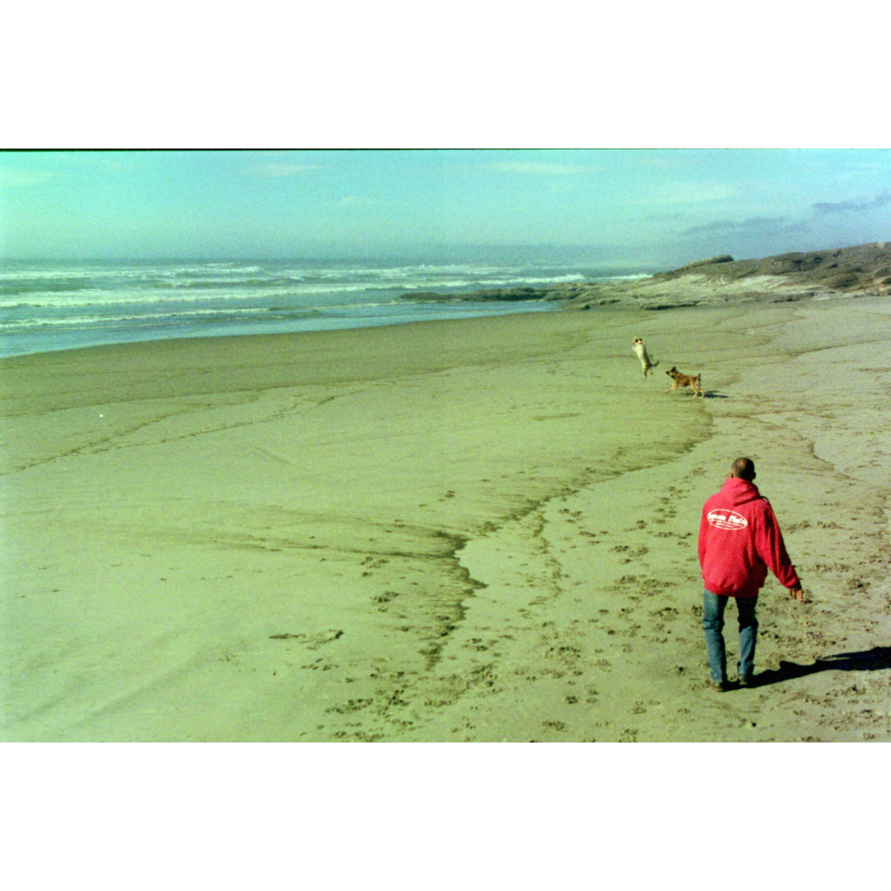 At the beach playing frisbee with the dogs. This trip they found Alsea Oregon and knew they wanted to buy property there. Their dream has come true.