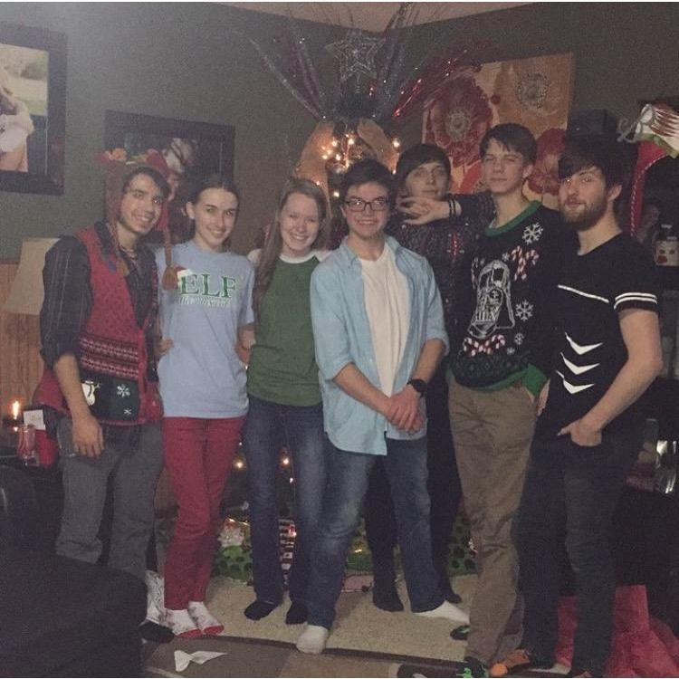 This photo marks our first Christmas celebration with friends. It also features Laura (bridesmaid) and Conner (groomsman). - December 17, 2016