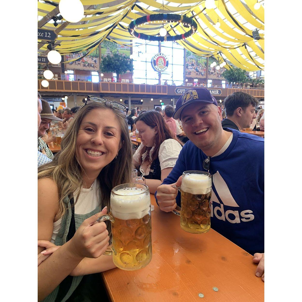 At Oktoberfest, raising pints and sharing stories at a table with friends from seven different countries. Great beer, even better company, and memories we’ll never forget!