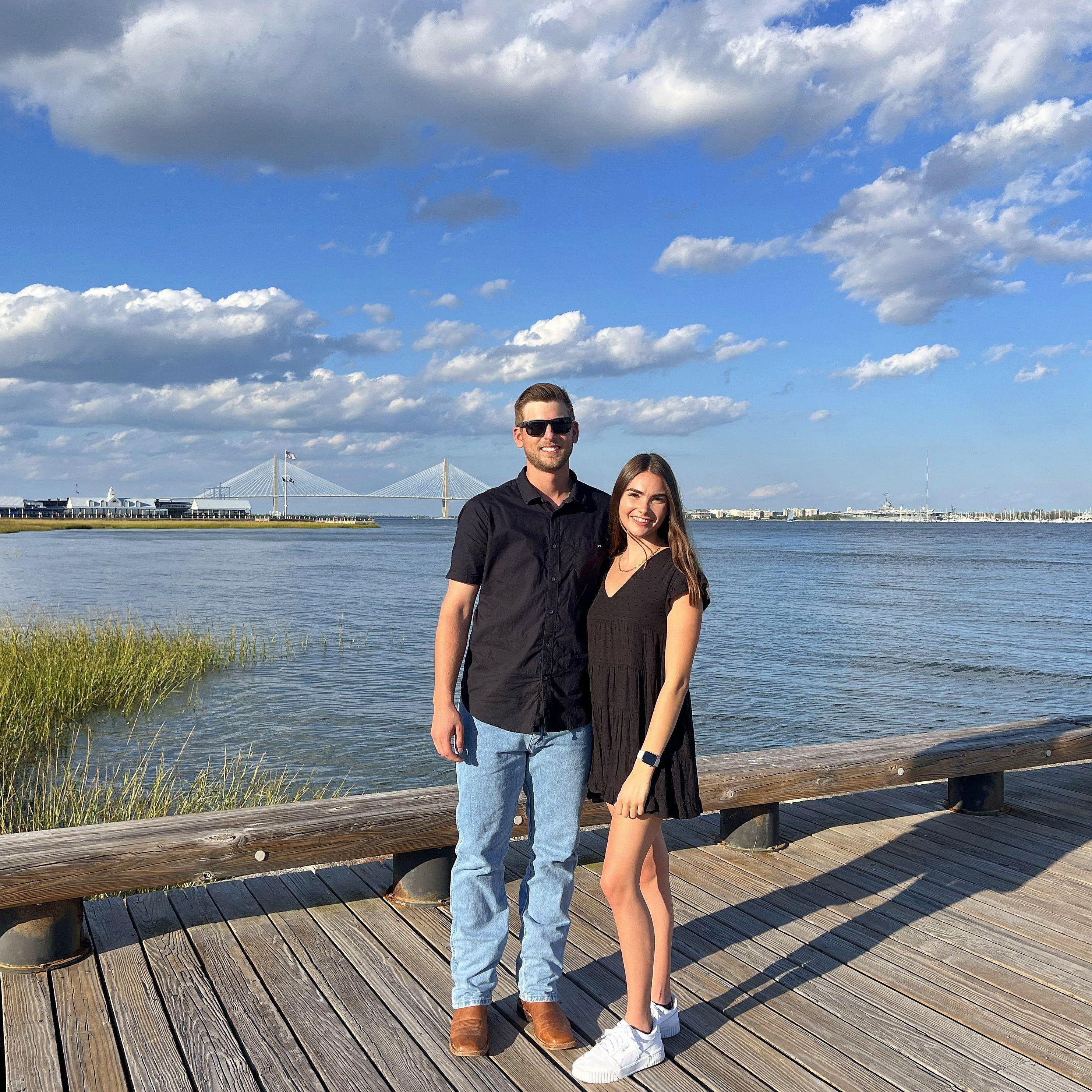 Right before Travis proposed! Walking along the water in Charleston, South Carolina.