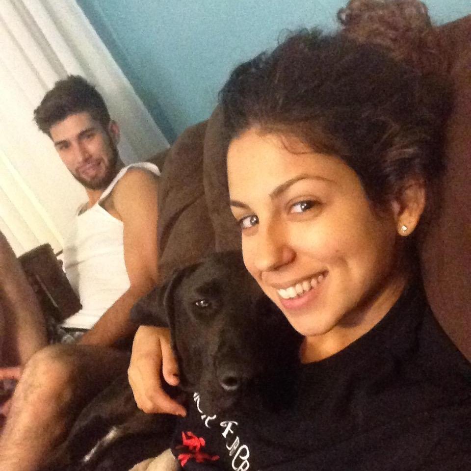 cuddling at home , watching TV with the pups