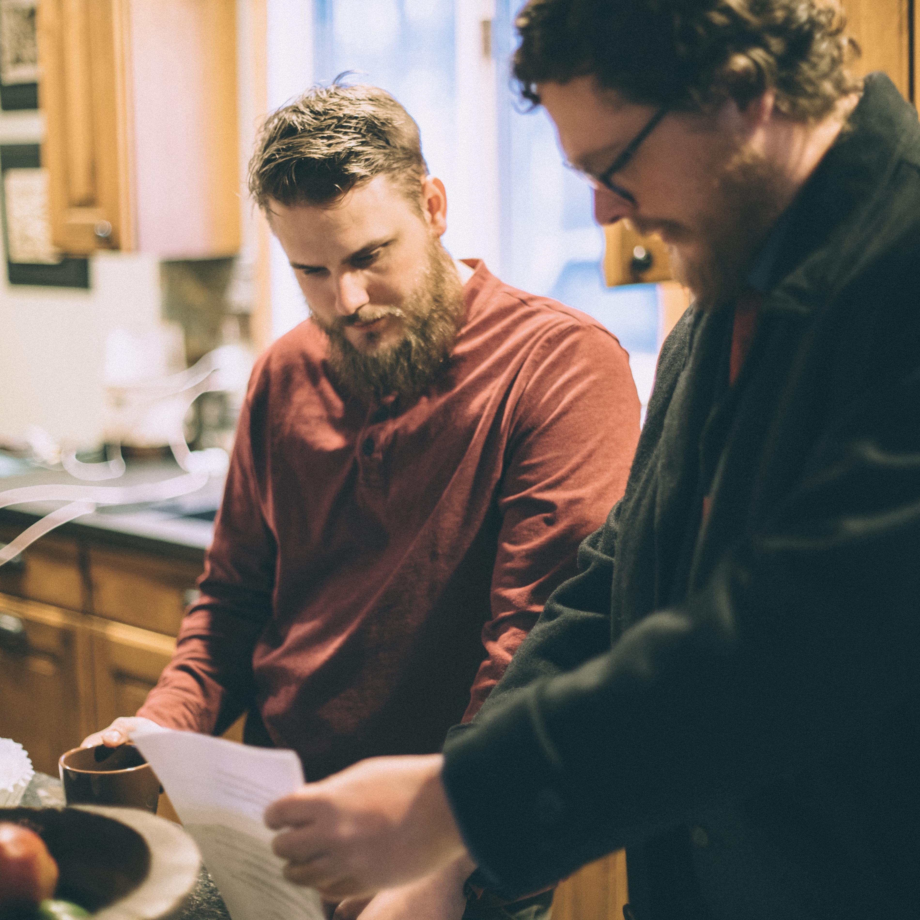 Tyler and Justin going over the ceremony agenda