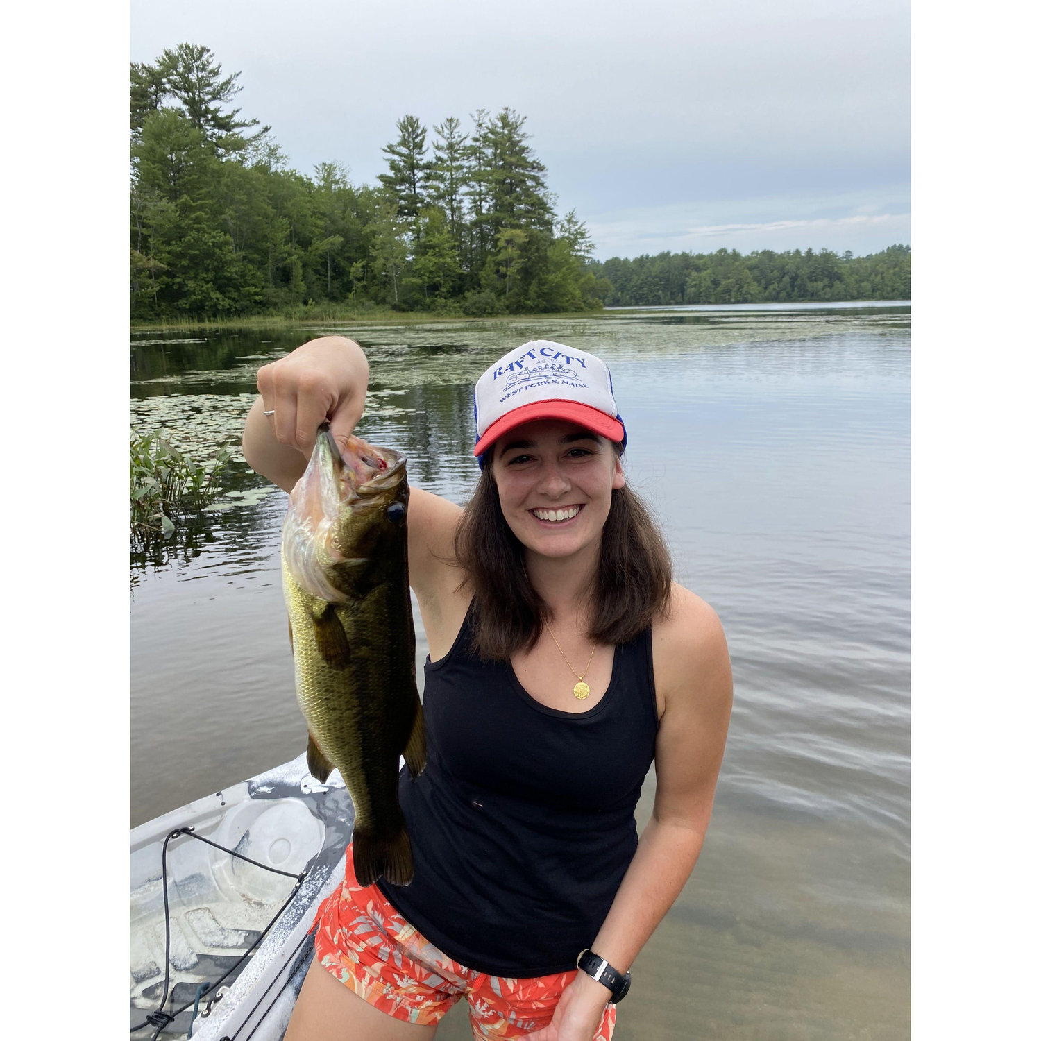 Alana’s first fish. This was on our third date, when we sank Scott's kayak in Norway Lake.
