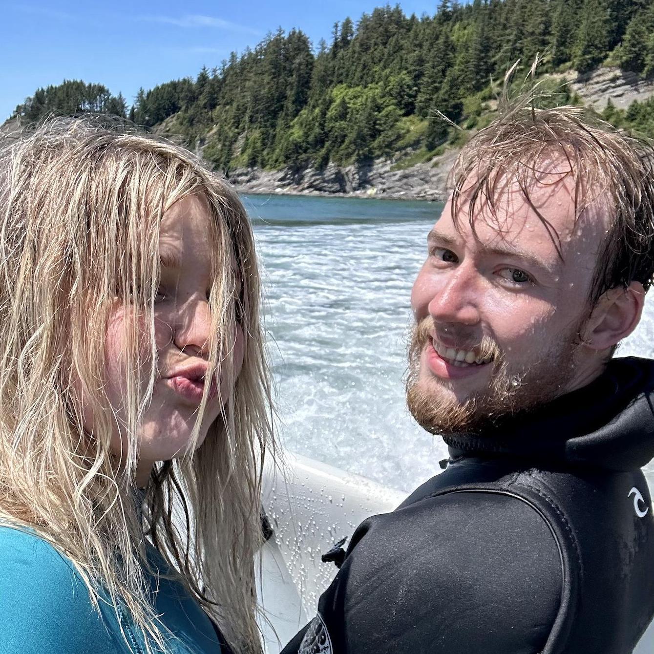 Jaret teaching Tess how to surf at the Oregon Coast.