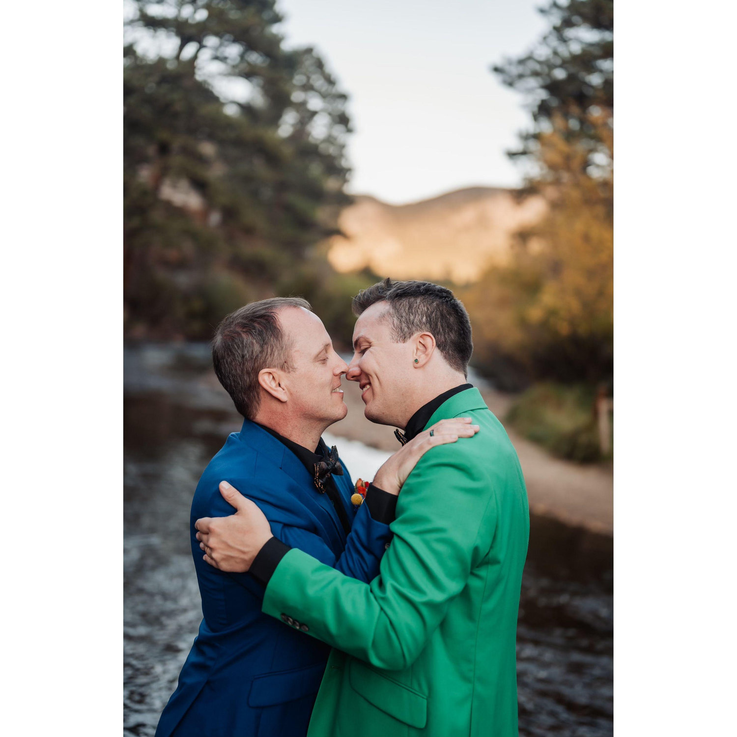 Kissing by the river.