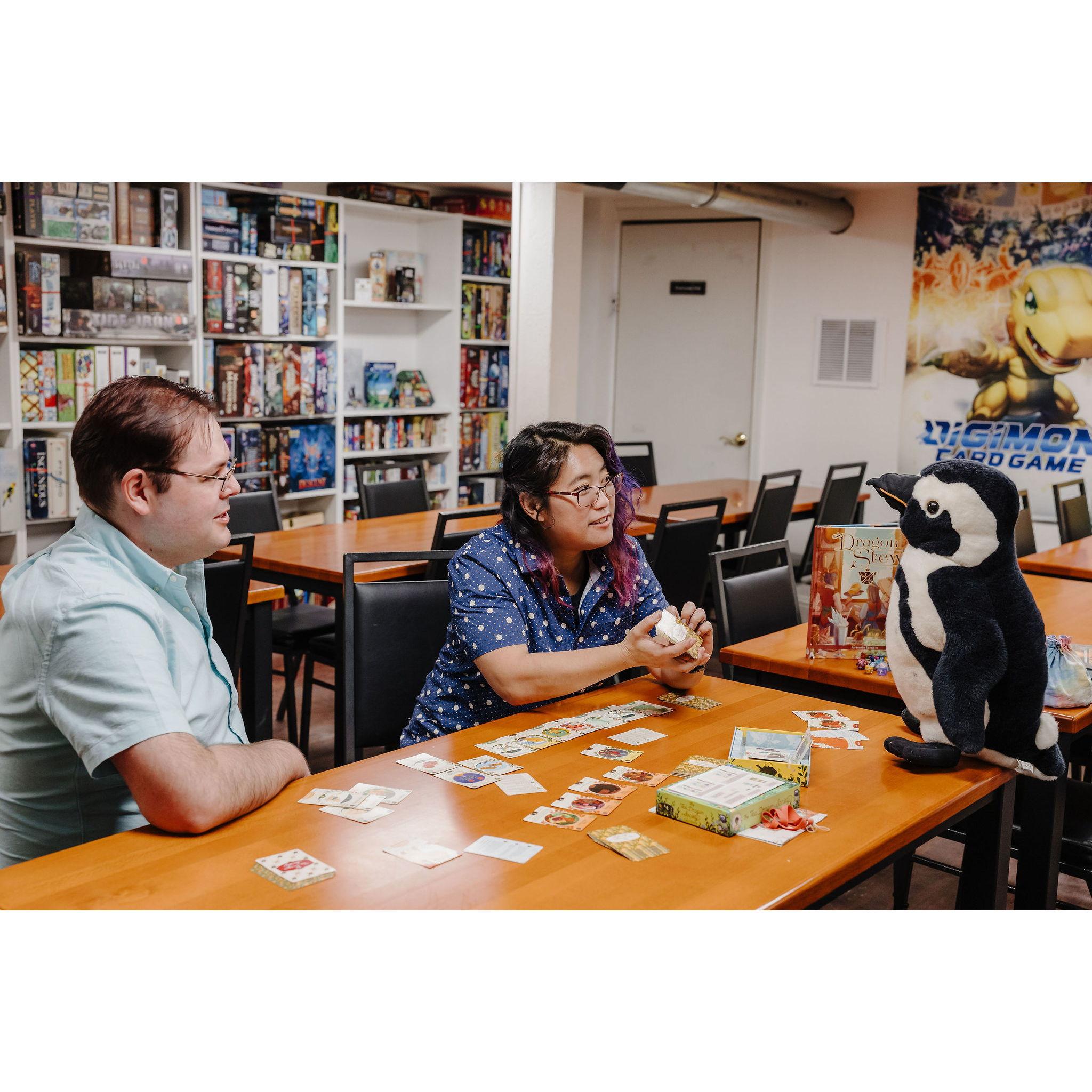 Teaching Howard how to play Tea Dragon Society.