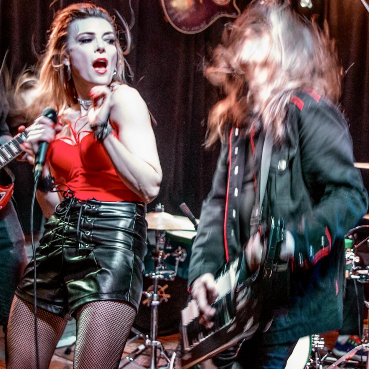 Fronting a Nu Wavers show at the Wild Hare, April 2023