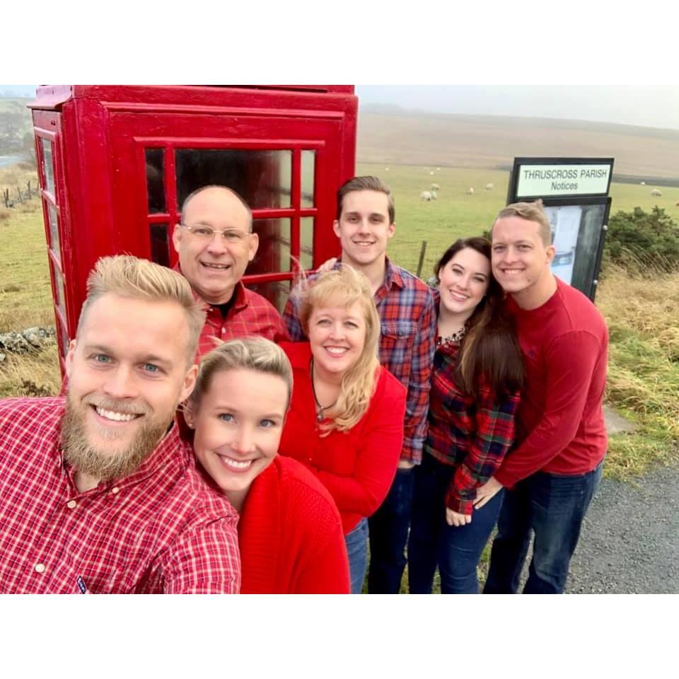 Family picture at the famous Chick family red phone booth