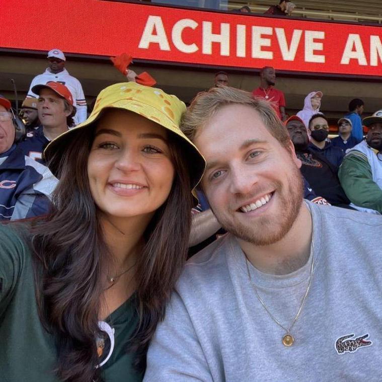 Even though our home is divided (Packers vs. Bears) we have fun at the games!