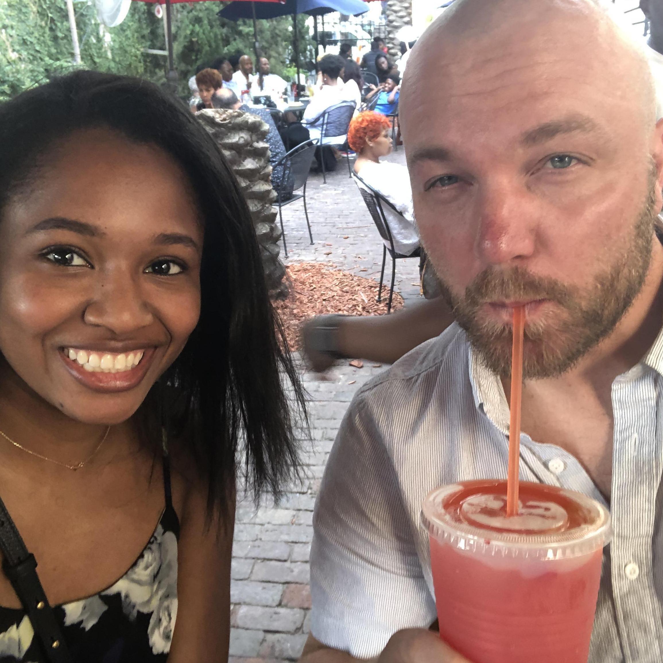 Our first vacation together was in New Orleans! We love the city and cannot wait to get married there! This is a picture of Derek drinking his first hurricane.