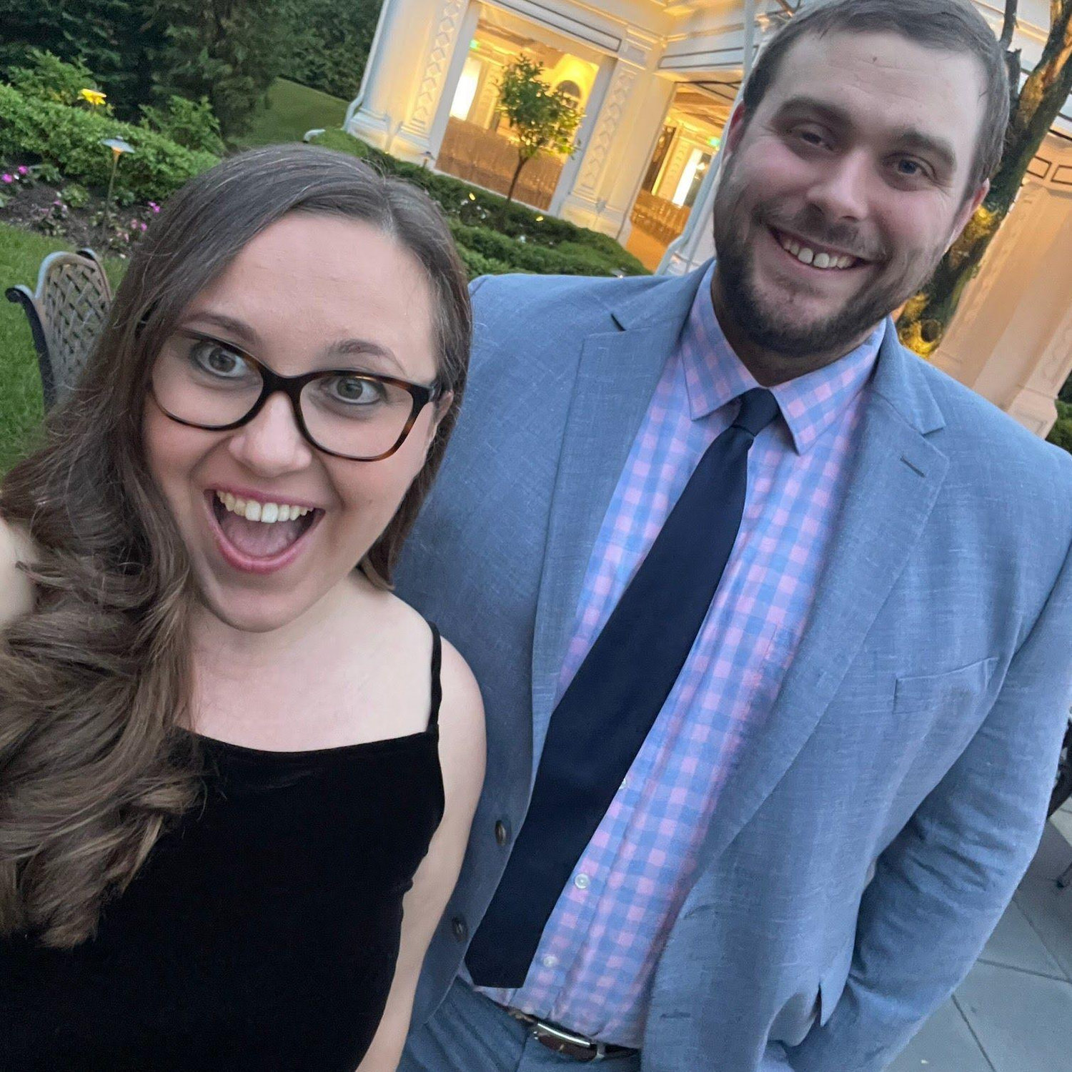 Alt: selfie of Maeghan and Keiran at a wedding venue in NJ