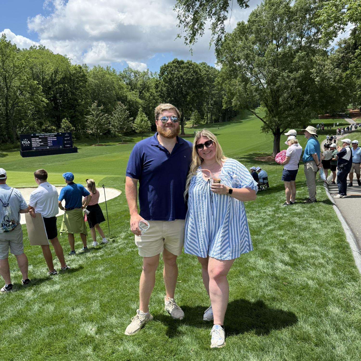 He was in golf heaven, she was just there for the sunshine and drinks!