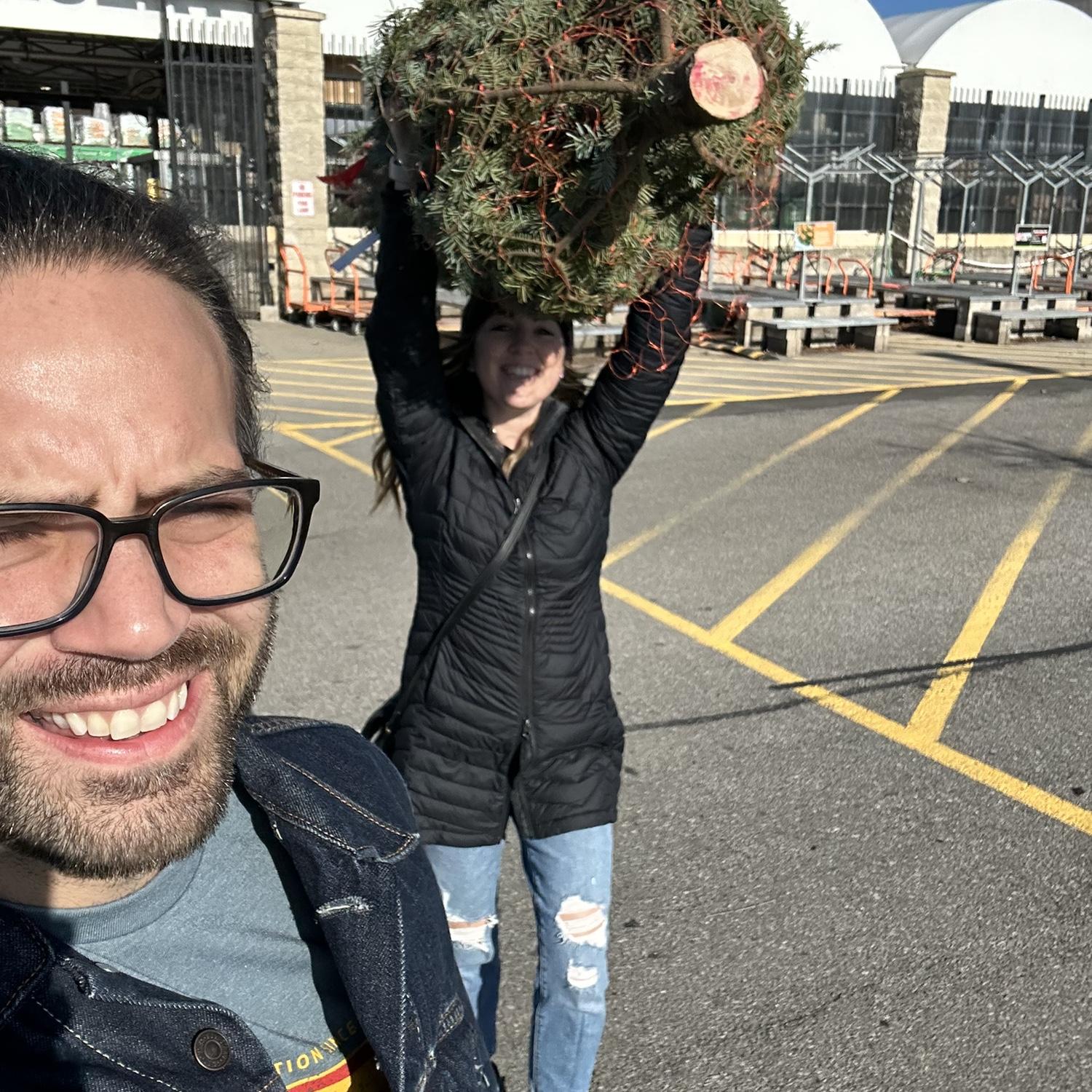 When Christmas tree shopping, it has to be as tall as Mark and Logan has to be able to lift it over her head.