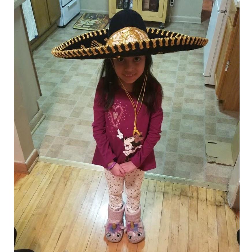 Ellie in a sombrero Julio brought home from Mexica
