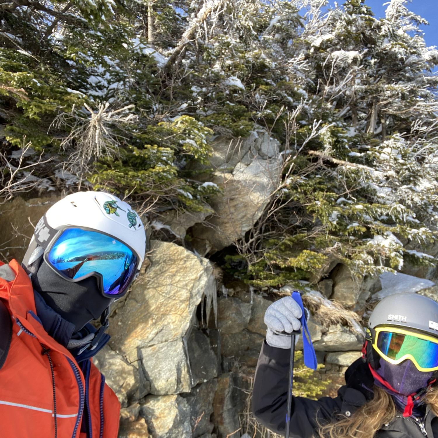 Skiing, next to a cool outcropping of rocks in Vermont!