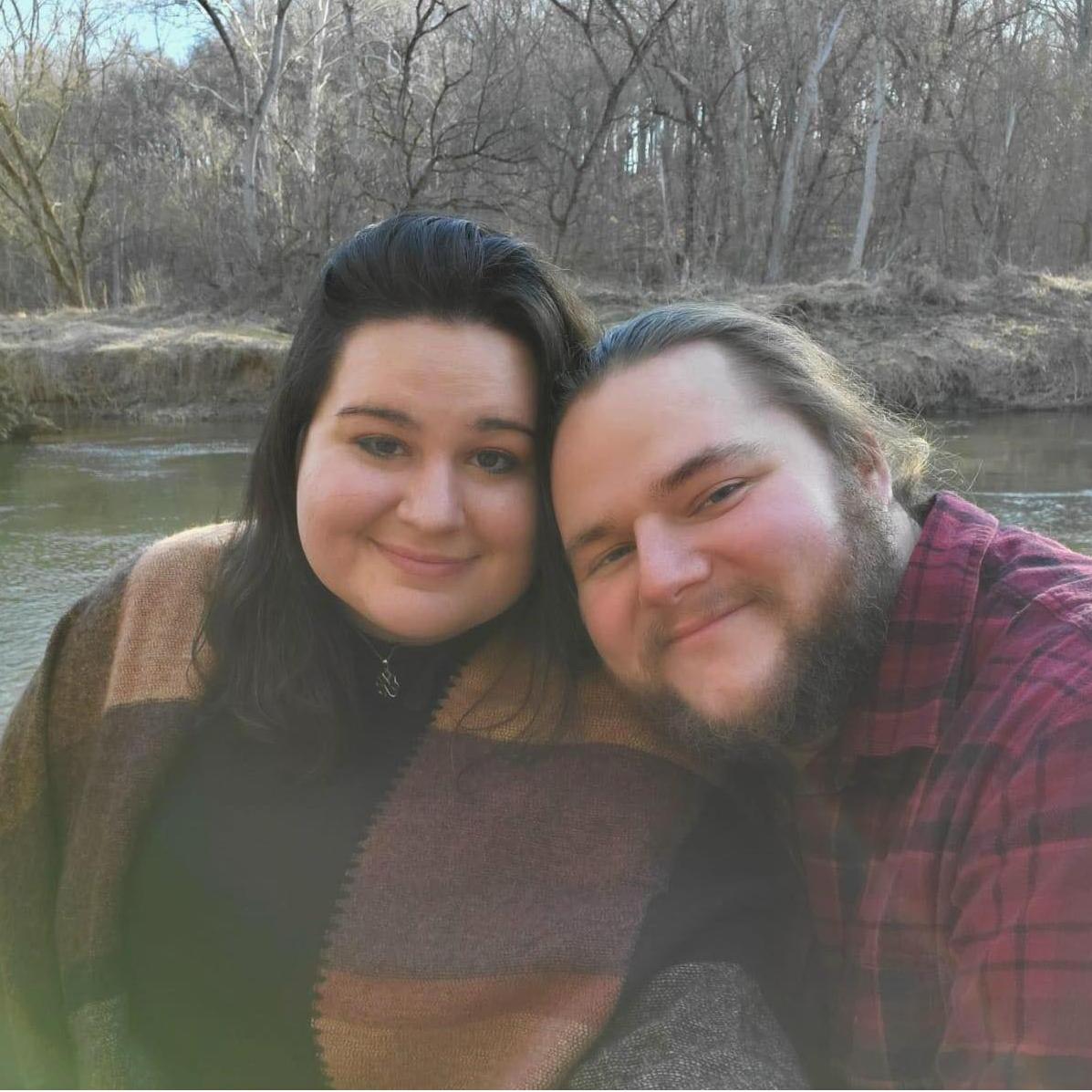 February 2022 - Our favorite spot on the nearby trail: down by the water on a rock!