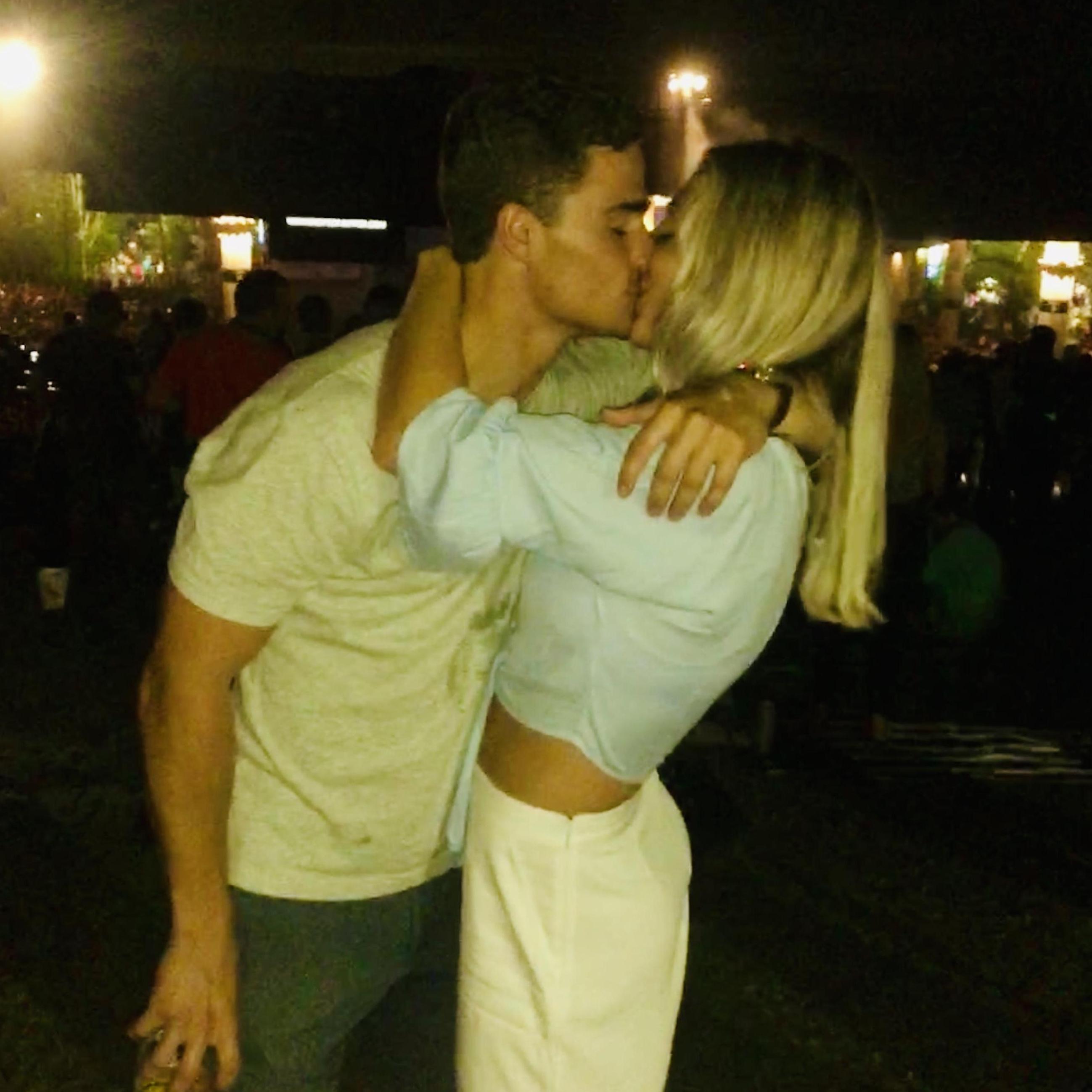 A stranger insisted on taking a picture of us enjoying a concert together because we were "so visibly in love!"