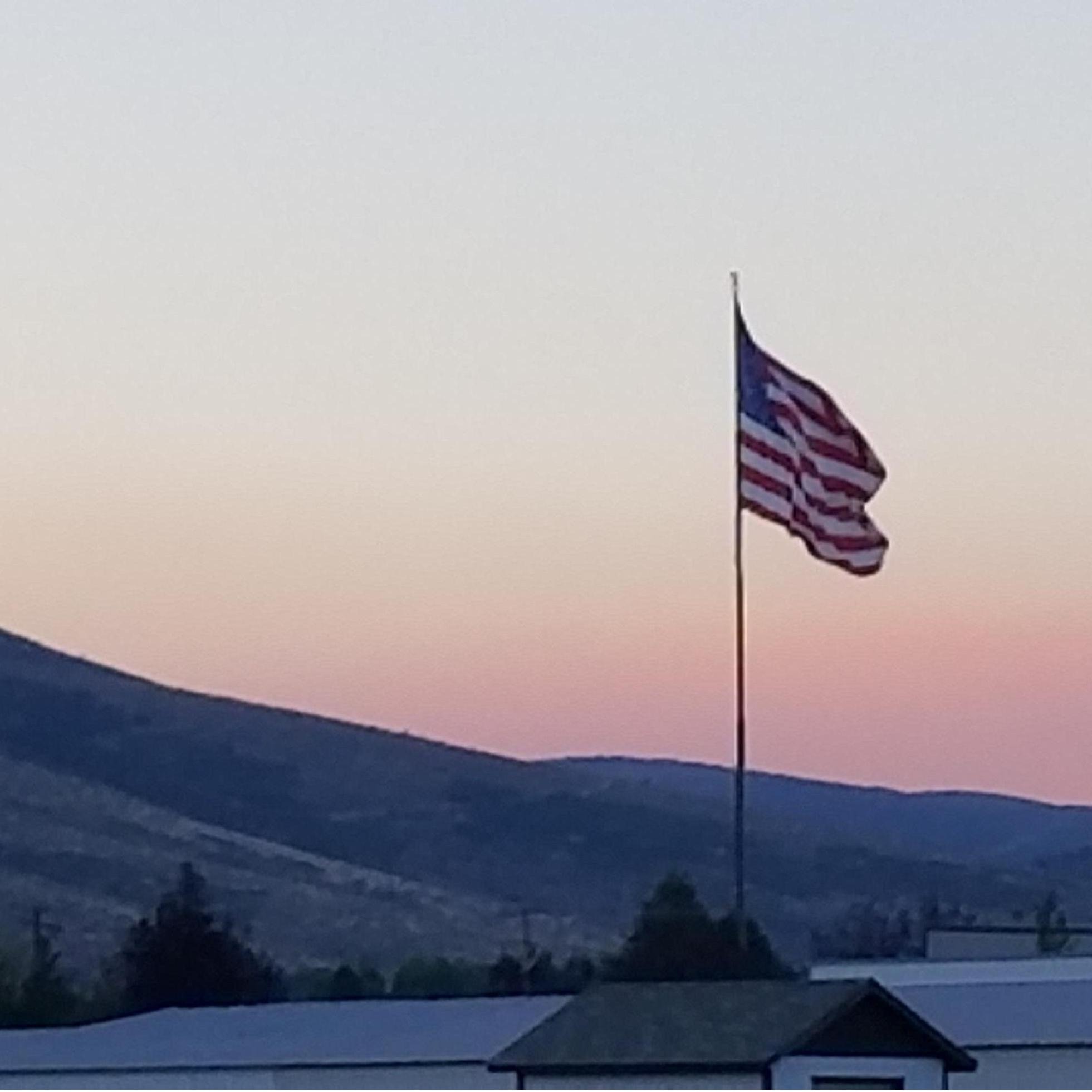Kamas flag and sunrise