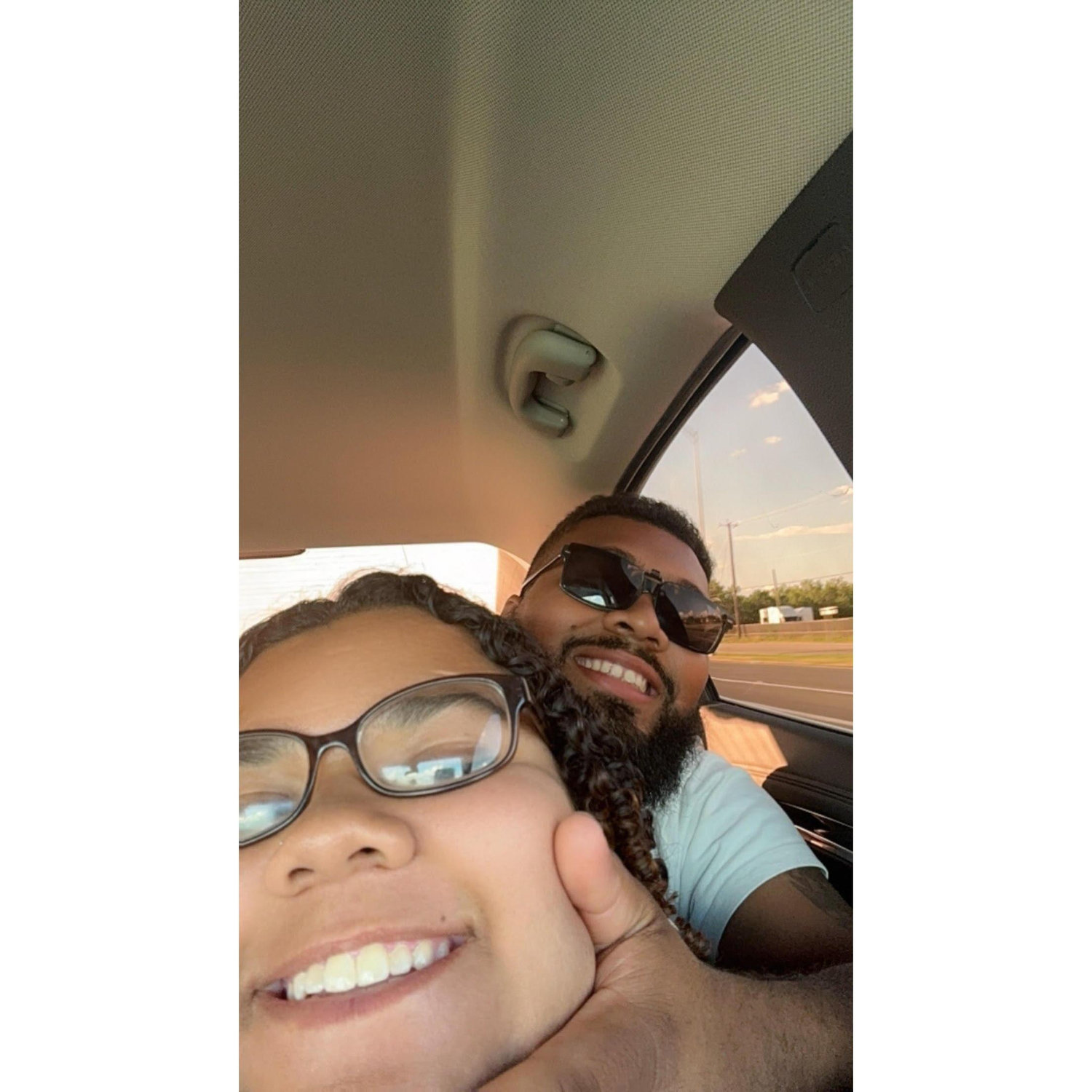 "This photo was taken on our way to Alex's birthday trip. I love spending time in his cozy arms." - Alexis