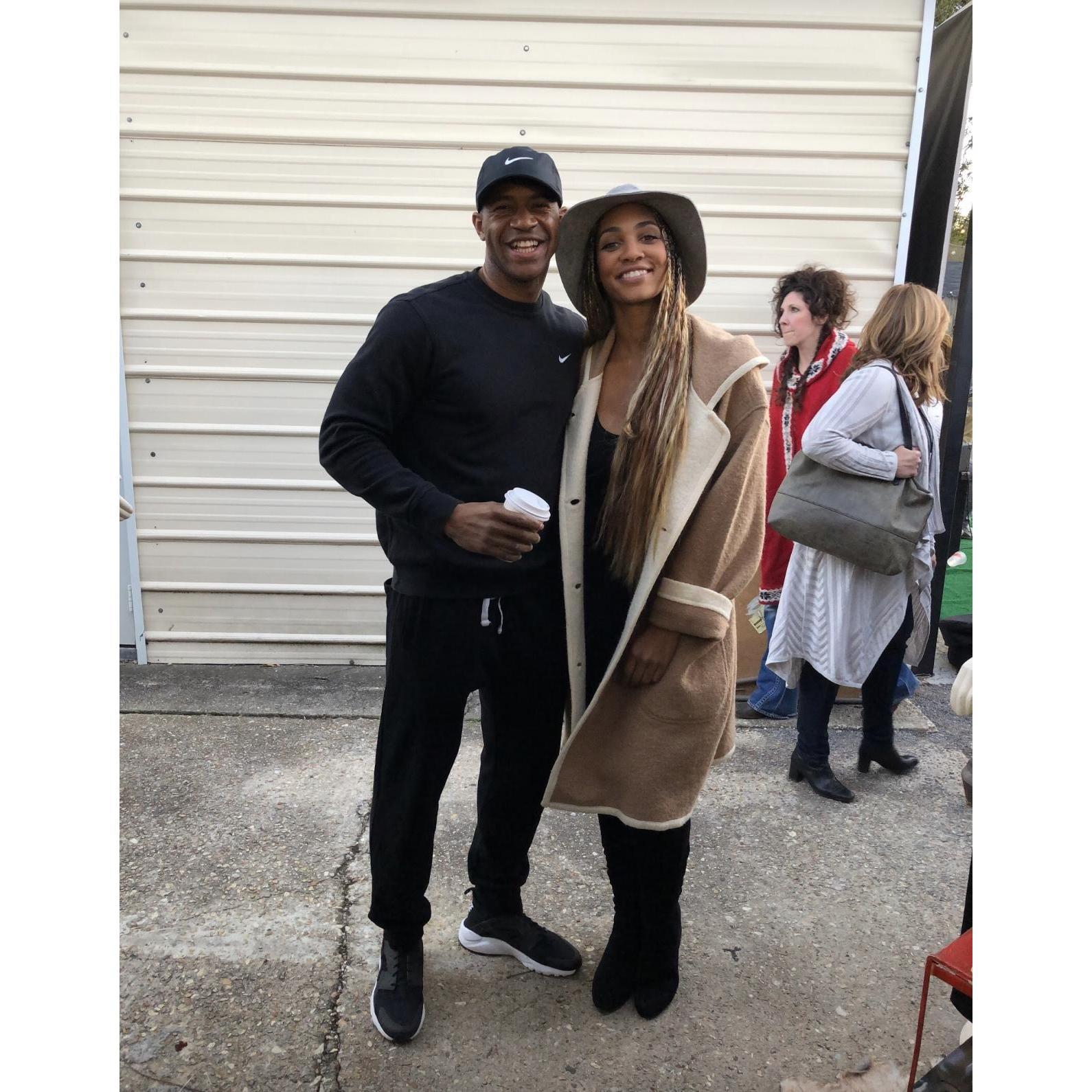 Sebastian visiting Lori at an outdoor market. He's the best supporter.