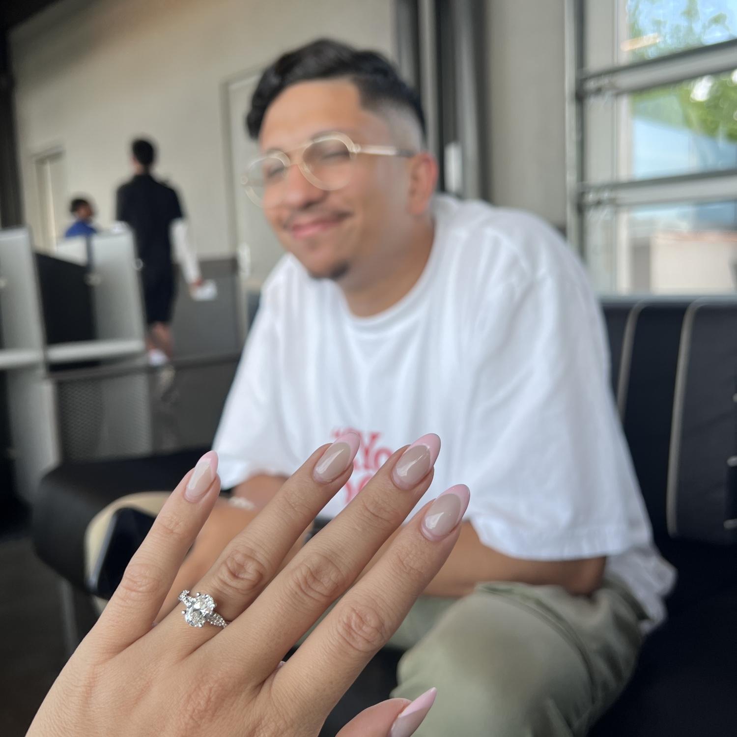 showing off the ring🤍