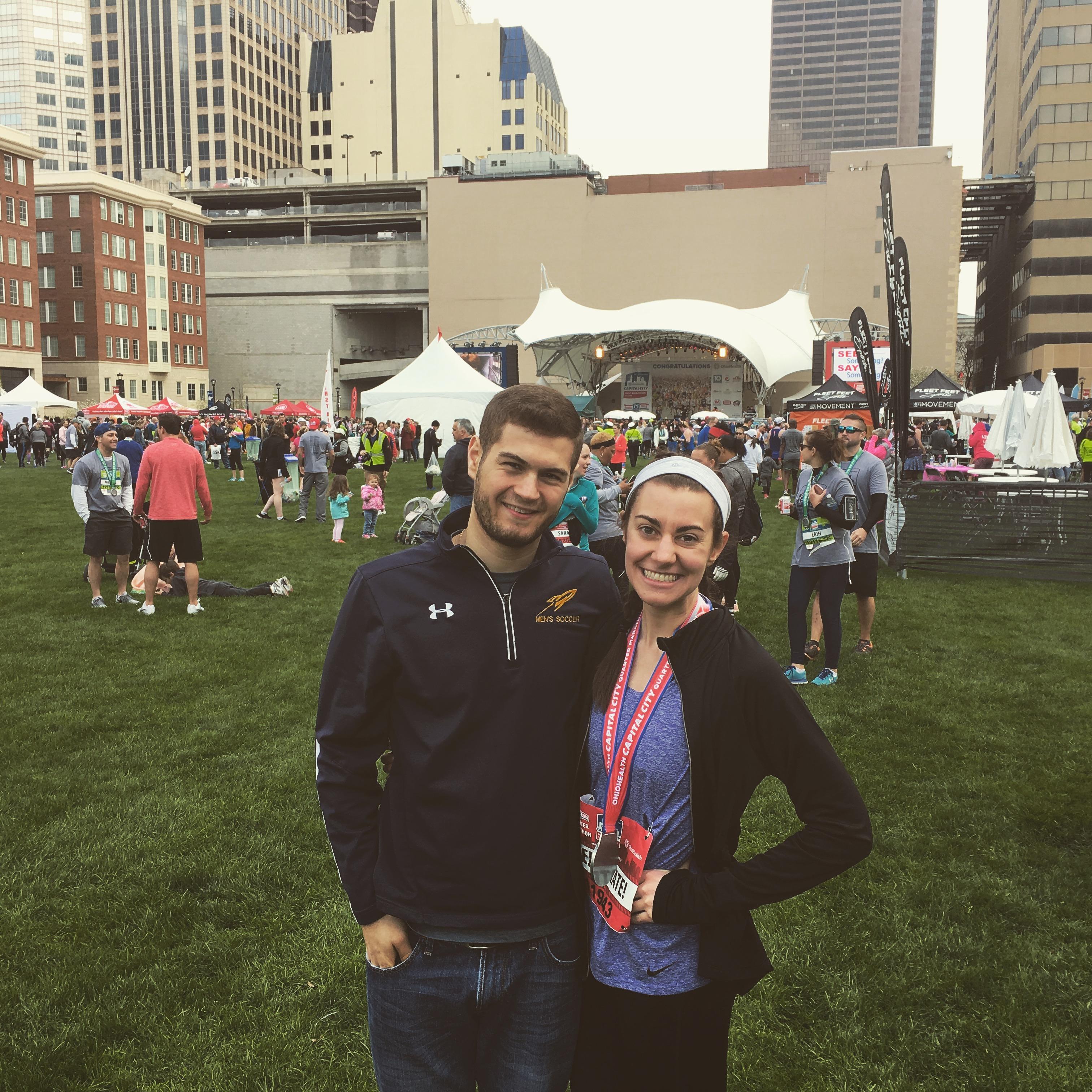 Brandon supporting Allison during on of her many races he woke up early for!