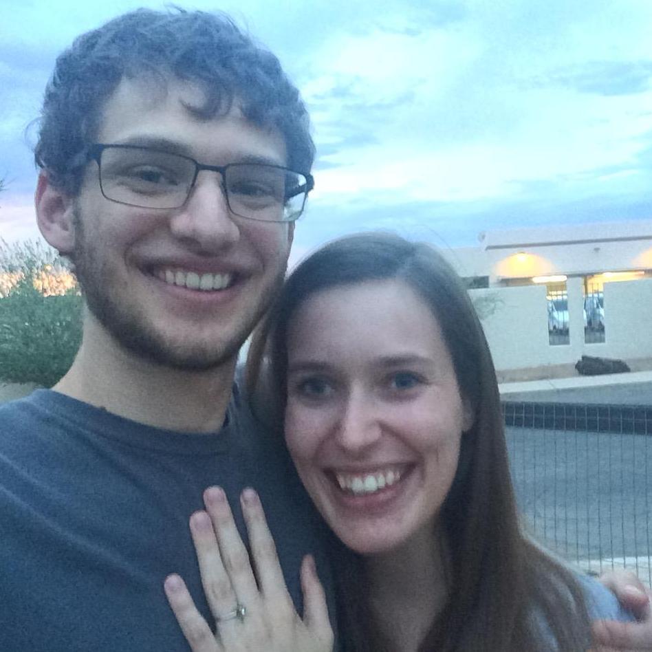 A blurry selfie outside our home, filled with the excitement of having just said "yes!" the night before.