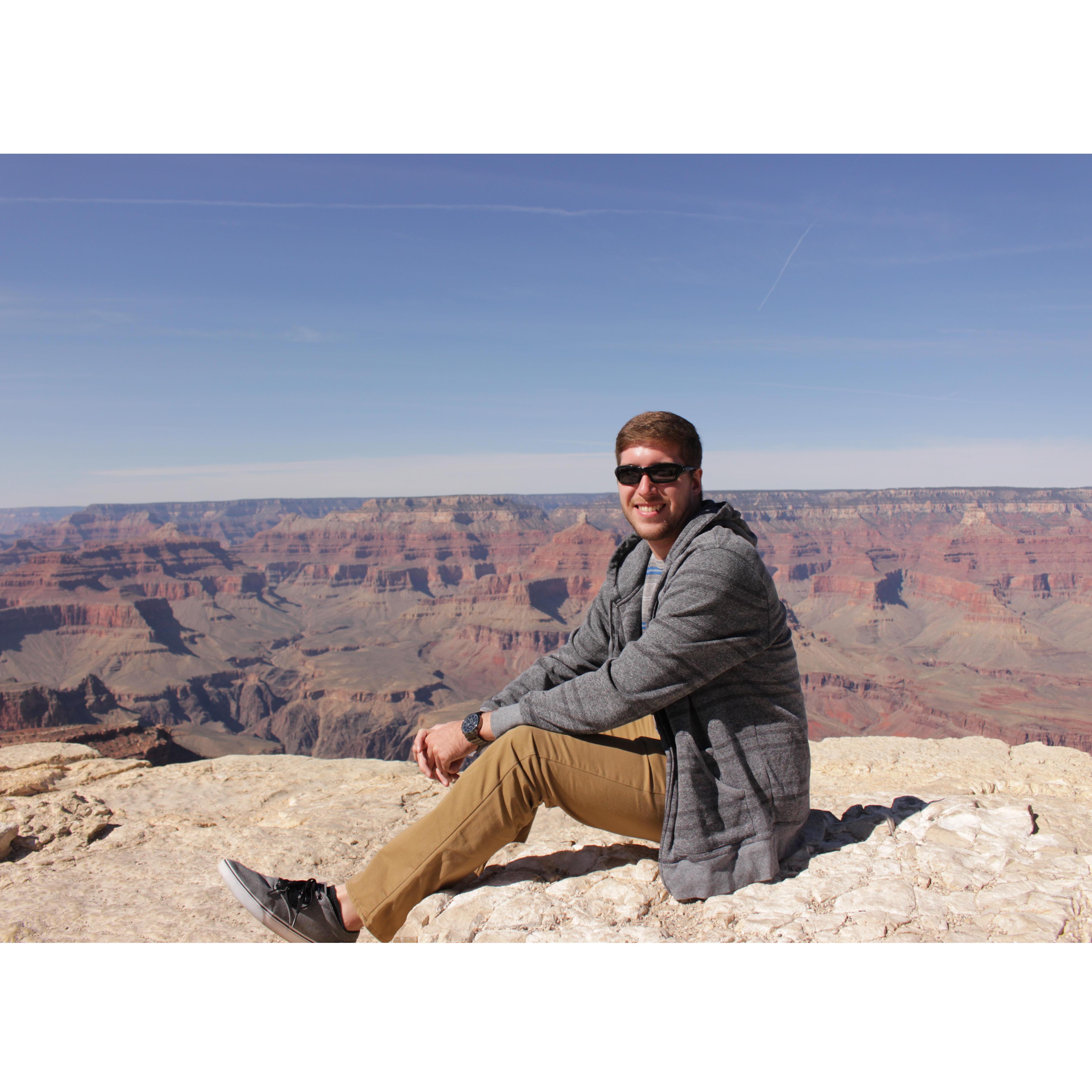 Chase at the edge of the Grand Canyon. Spring break 2016 trip to AZ!