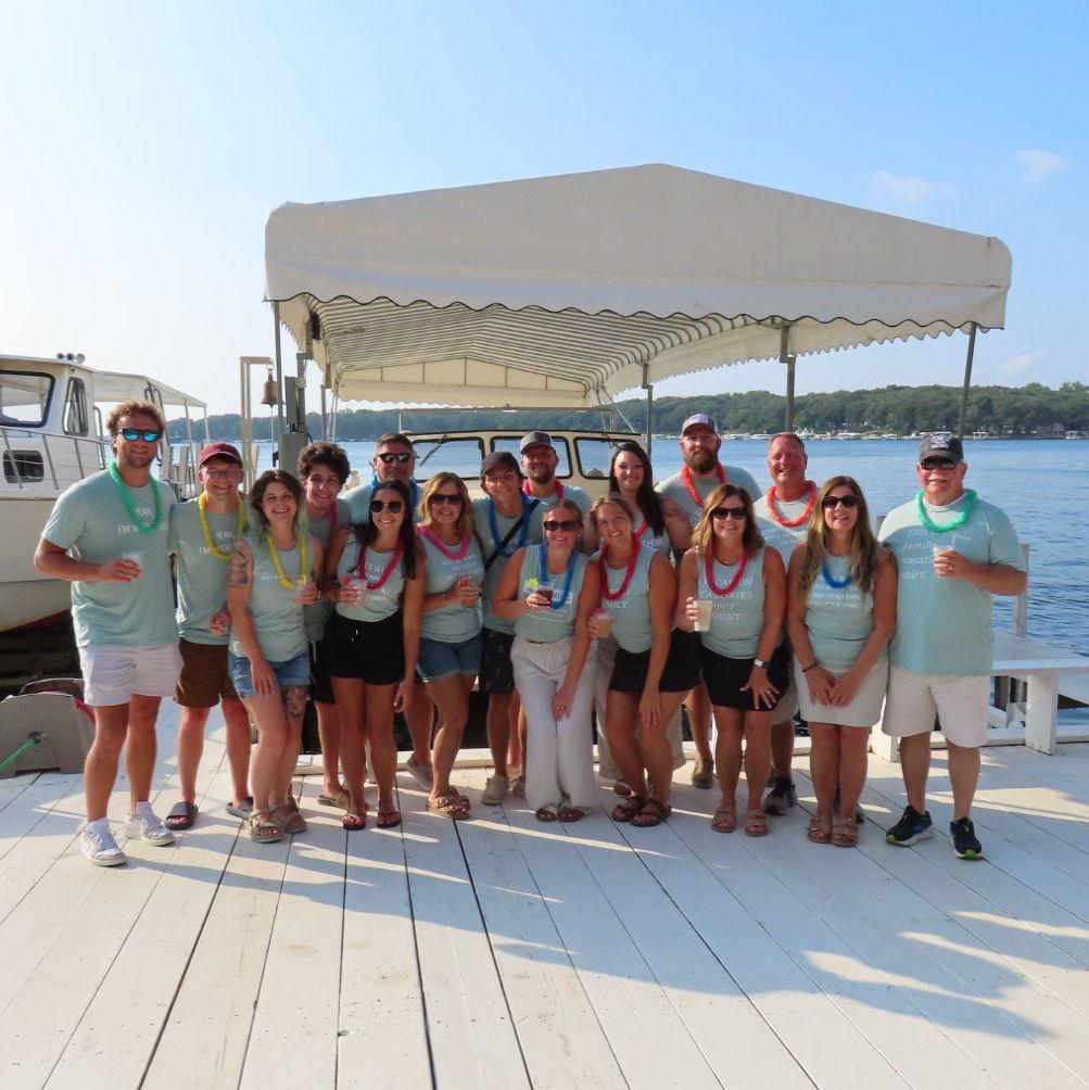 Family photo about an hour before Carter proposed on Mal's family trip to Okoboji. Shortly after this photo was taken, Carter disappeared to set up the proposal!