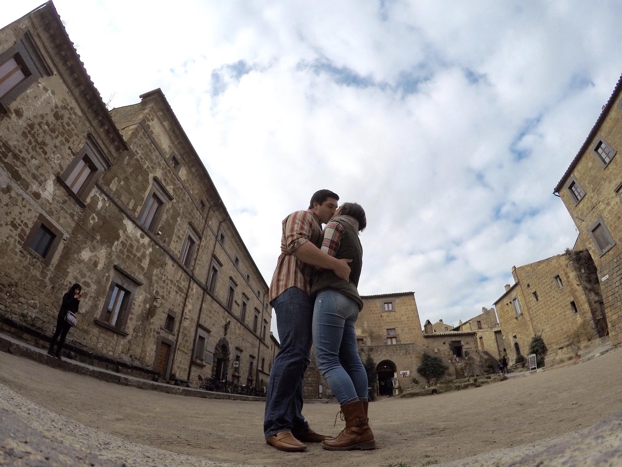 Stealing a kiss in a Piazza during our first trip to Italy together, November 2015.