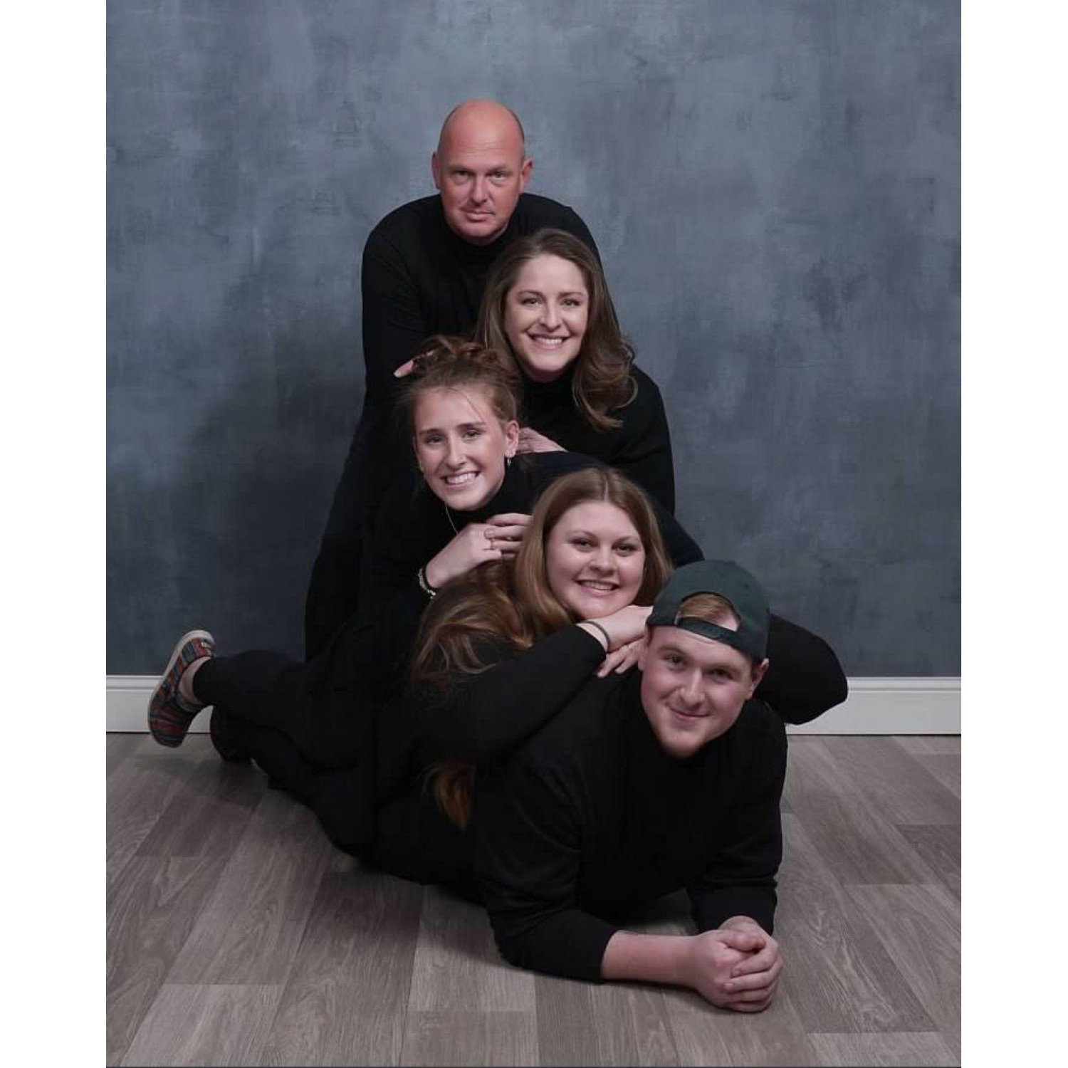 Maddie's first time in the Dugan family photo!