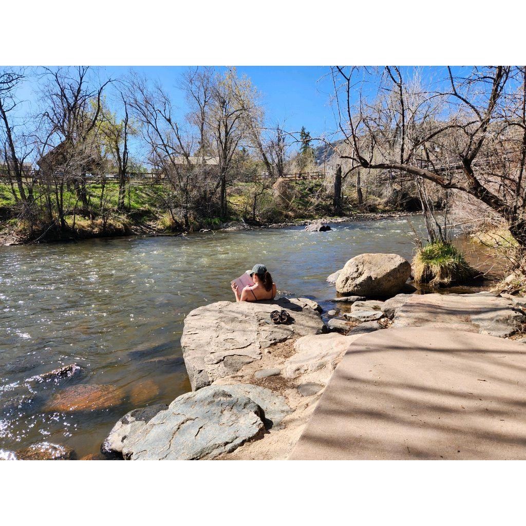 We love to read together, but especially in nature. This is us at Clear Creek in Golden