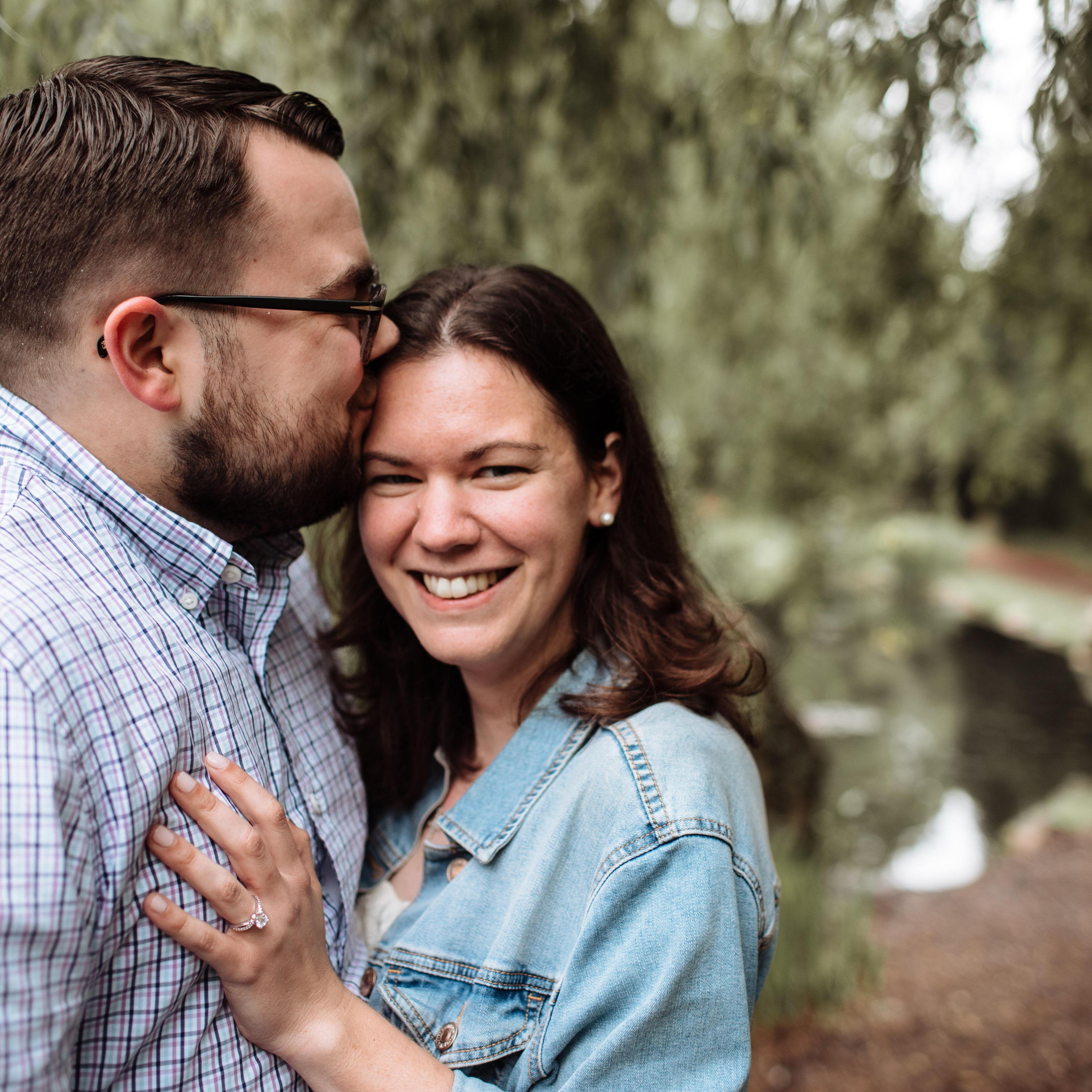 Two of Bethany's favorite things: forehead kisses and showing off her ring.