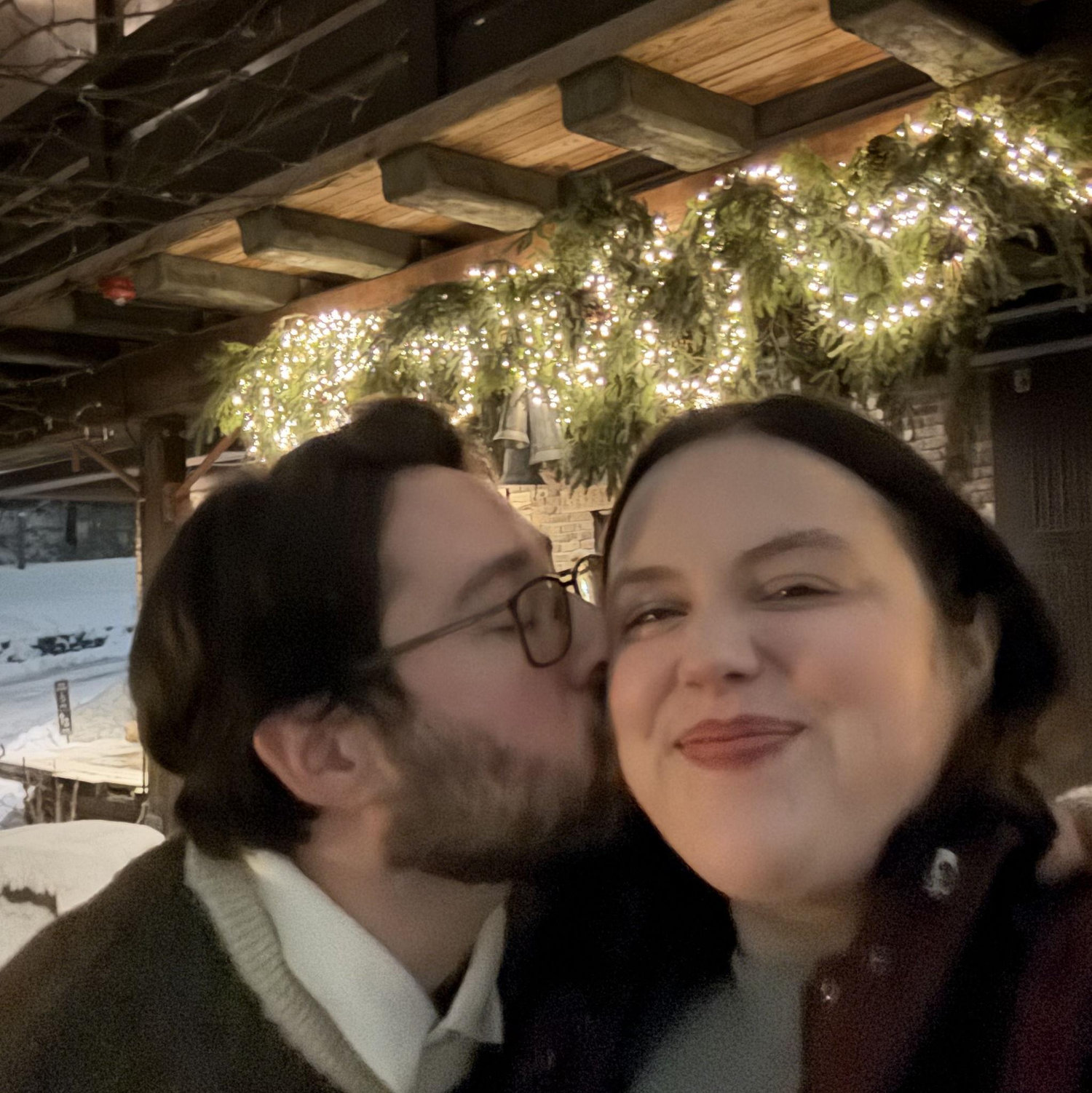 Us after leaving the restaurant where he proposed.