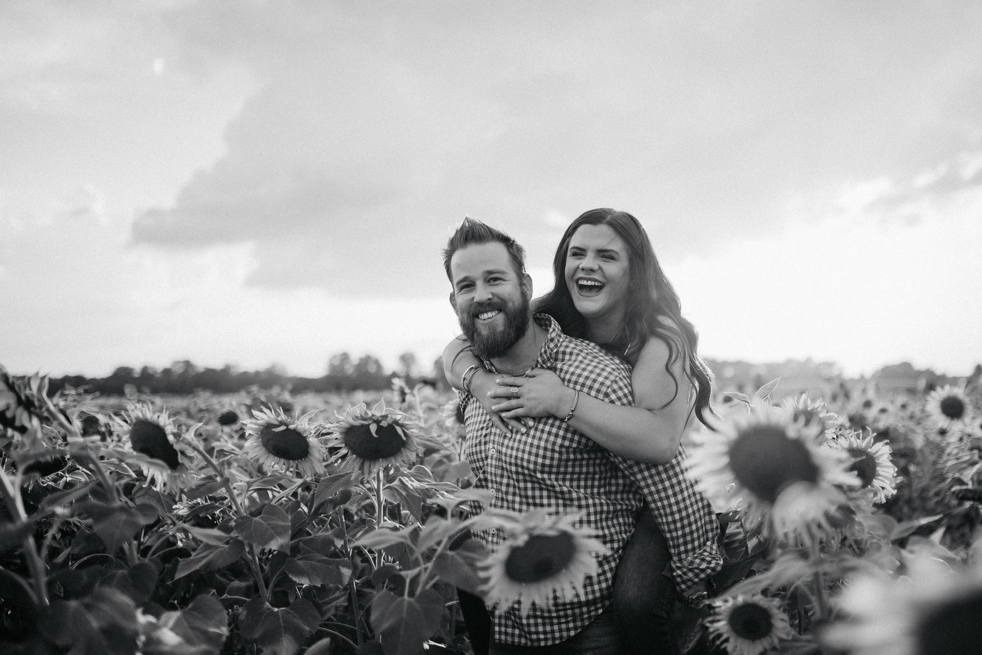 One of our favorite pictures from our sunflower shoot I made him do