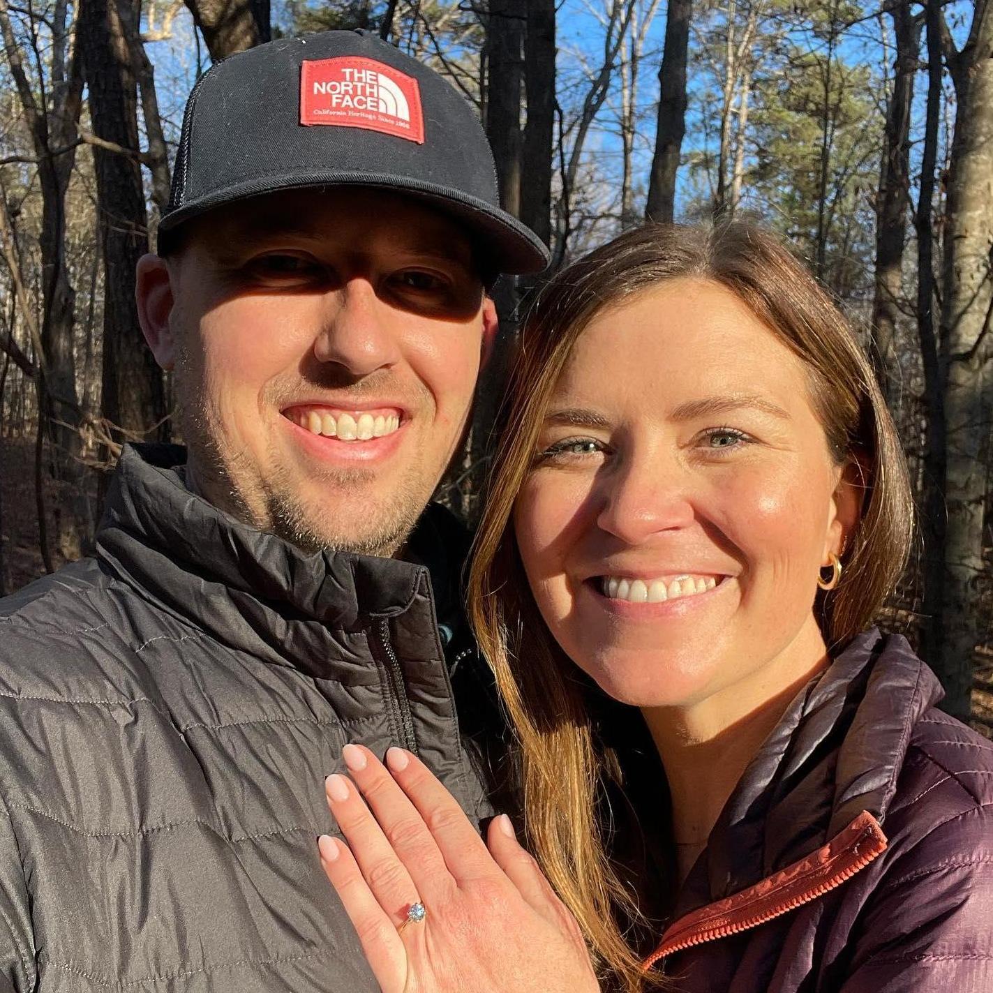 Our engagement. Tyler proposed by the pond on his grandfather's property in Raleigh. Just us two. :)