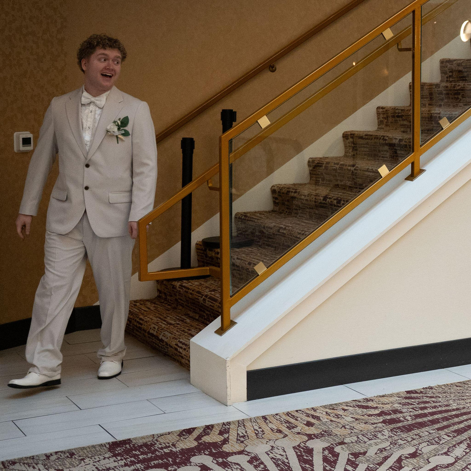 Dasyn turns the corner to look at his bride