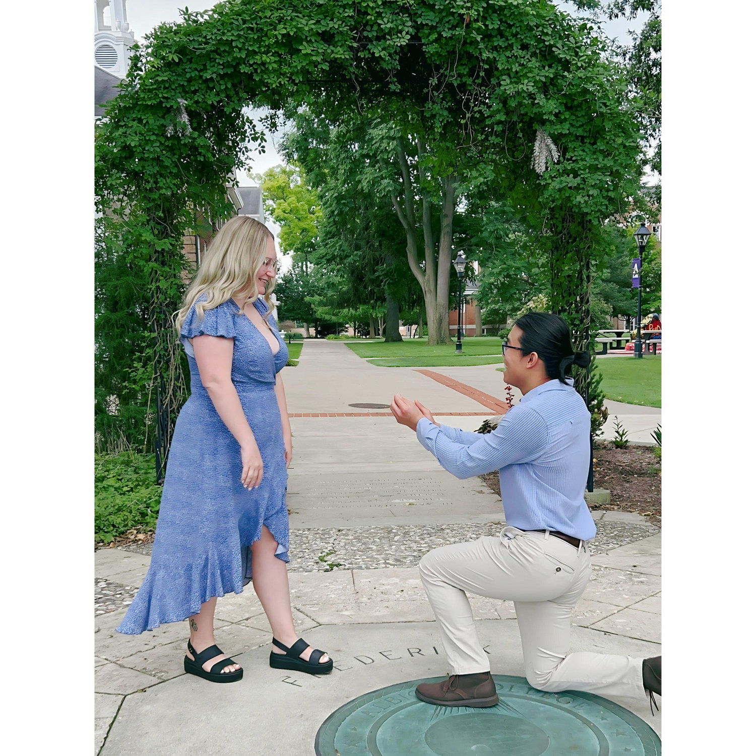 Matt's proposal in the grotto behind Vulgamore Hall, where we met in class.