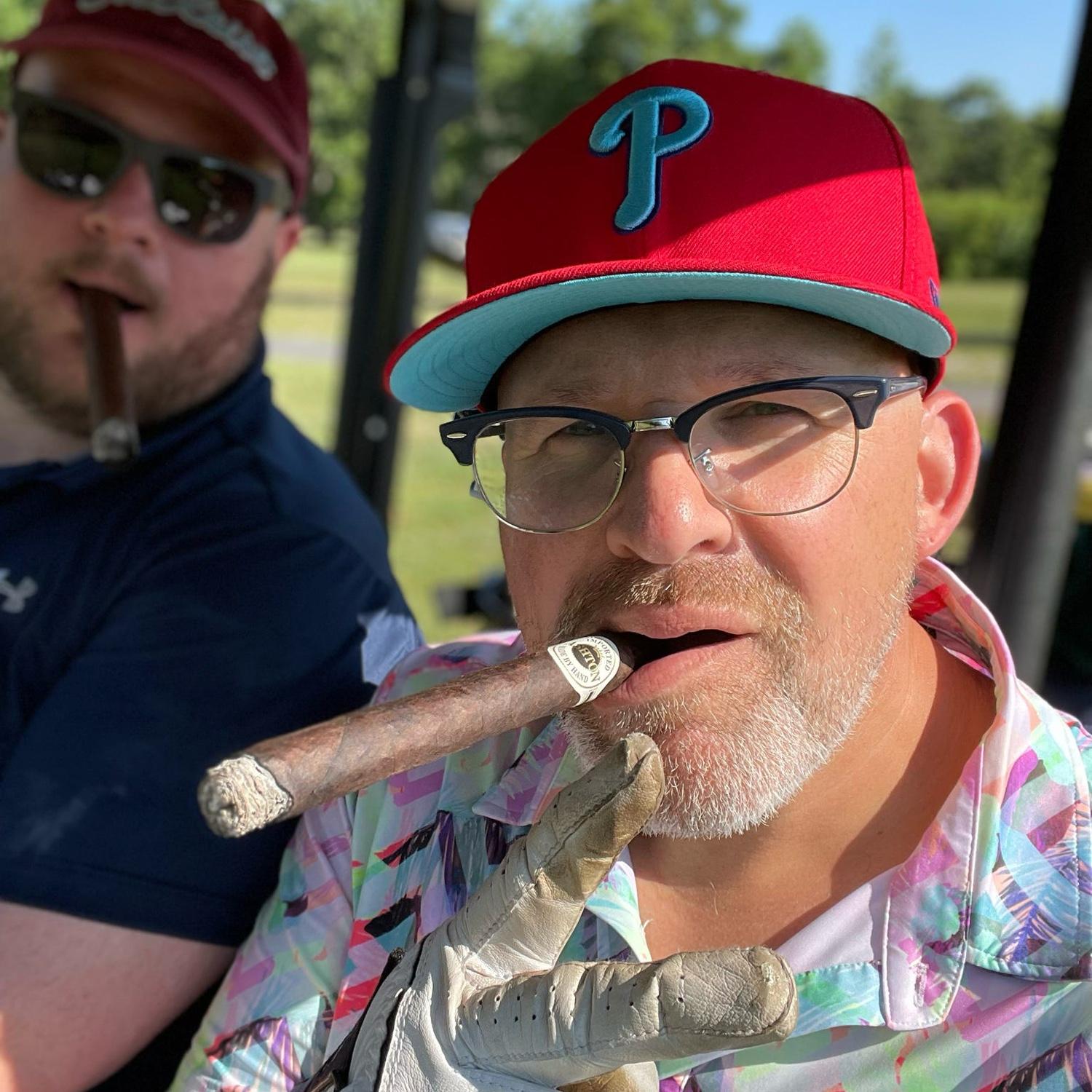 Rob and Rob hitting the green
