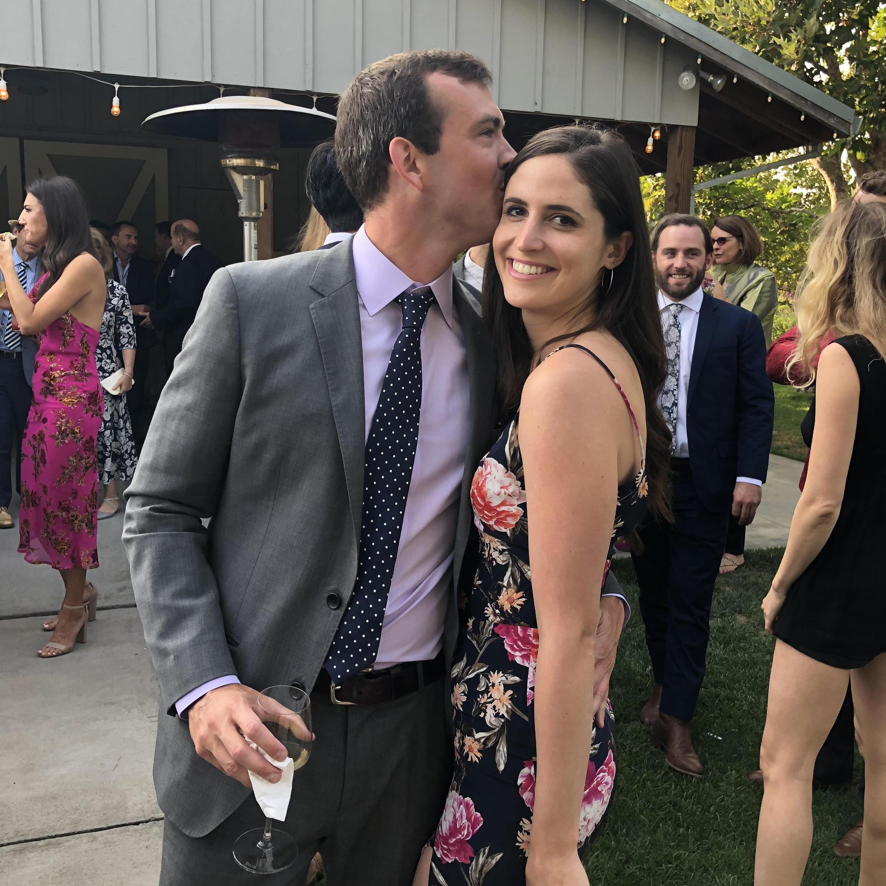 Our first photo together at our friends' Gracie & Max's wedding, the couple responsible for introducing us! August 2018