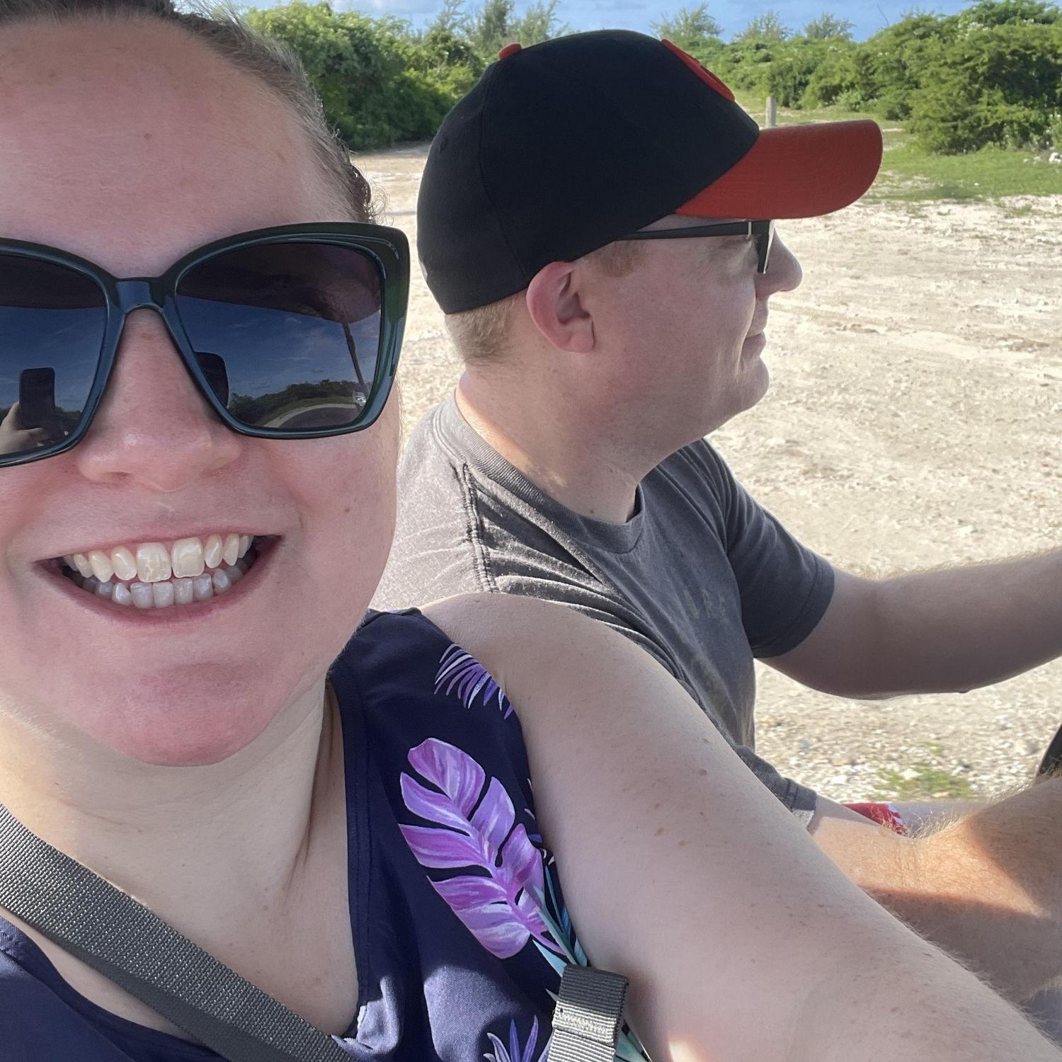 Driving around Grand Turk in the golf cart, feeding wild donkeys the carrots Chris bought out of some guy's trunk