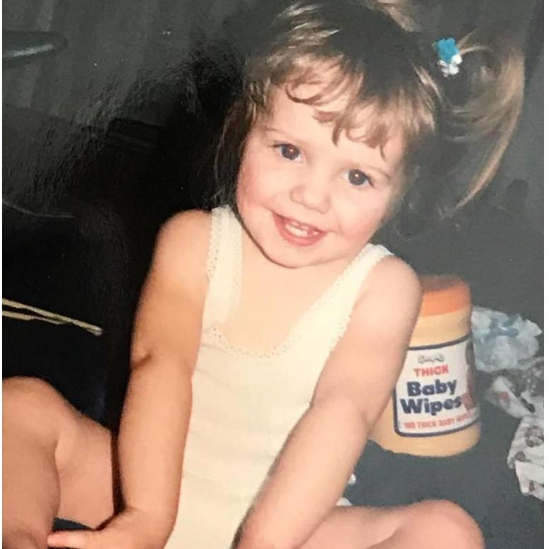 Bride, already stylish and posing for the camera at age 3.