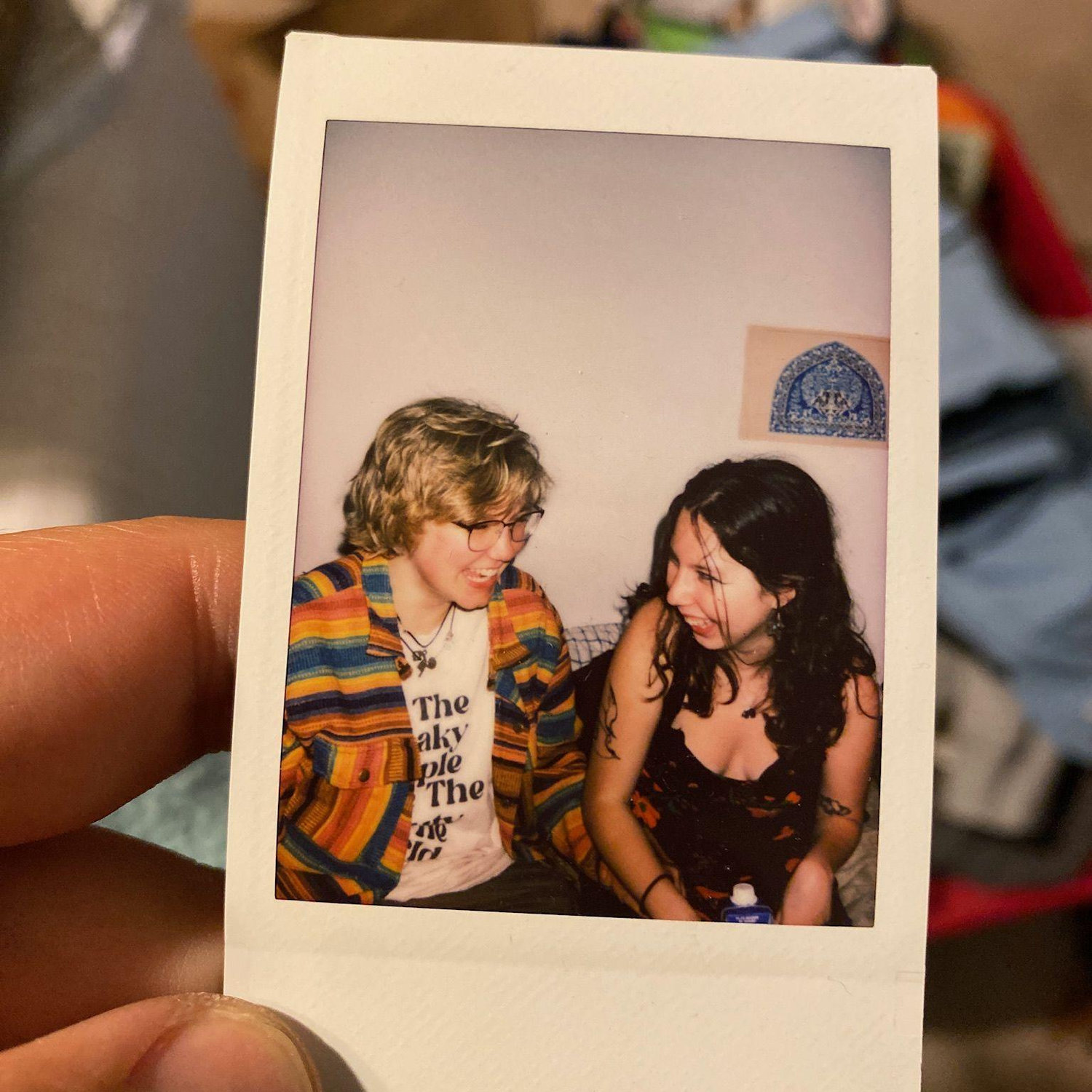 This is the first photo Mia and I have together as a couple, sitting on the bed in her friend's dorm room.
