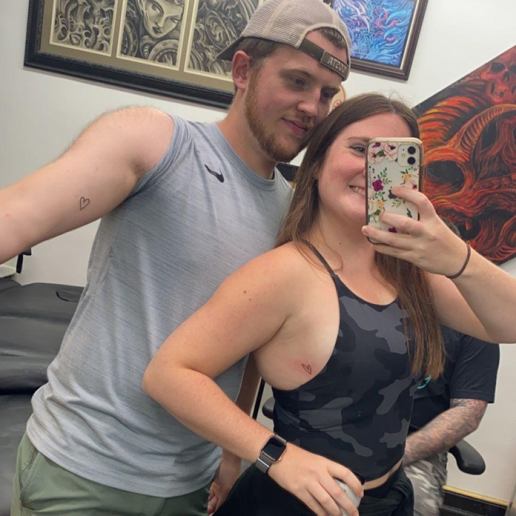 Adam and I have tattoos of hearts we drew for each other!