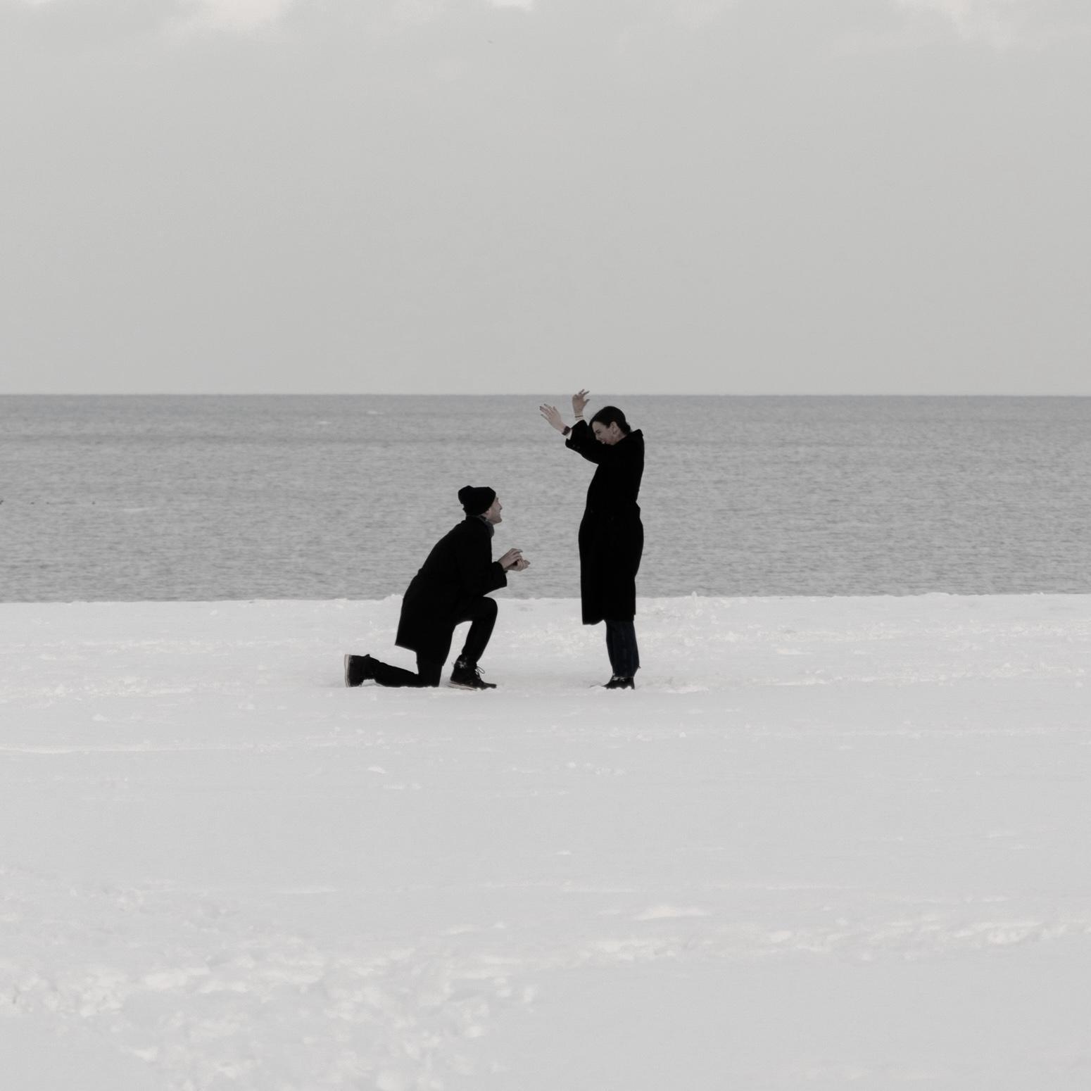 Engaged on 2/19/21. Geoff planned a scavenger hunt and took Allie to all of their memorable spots around the city. The last clue led them to the lake front, where Geoff got down on one knee.