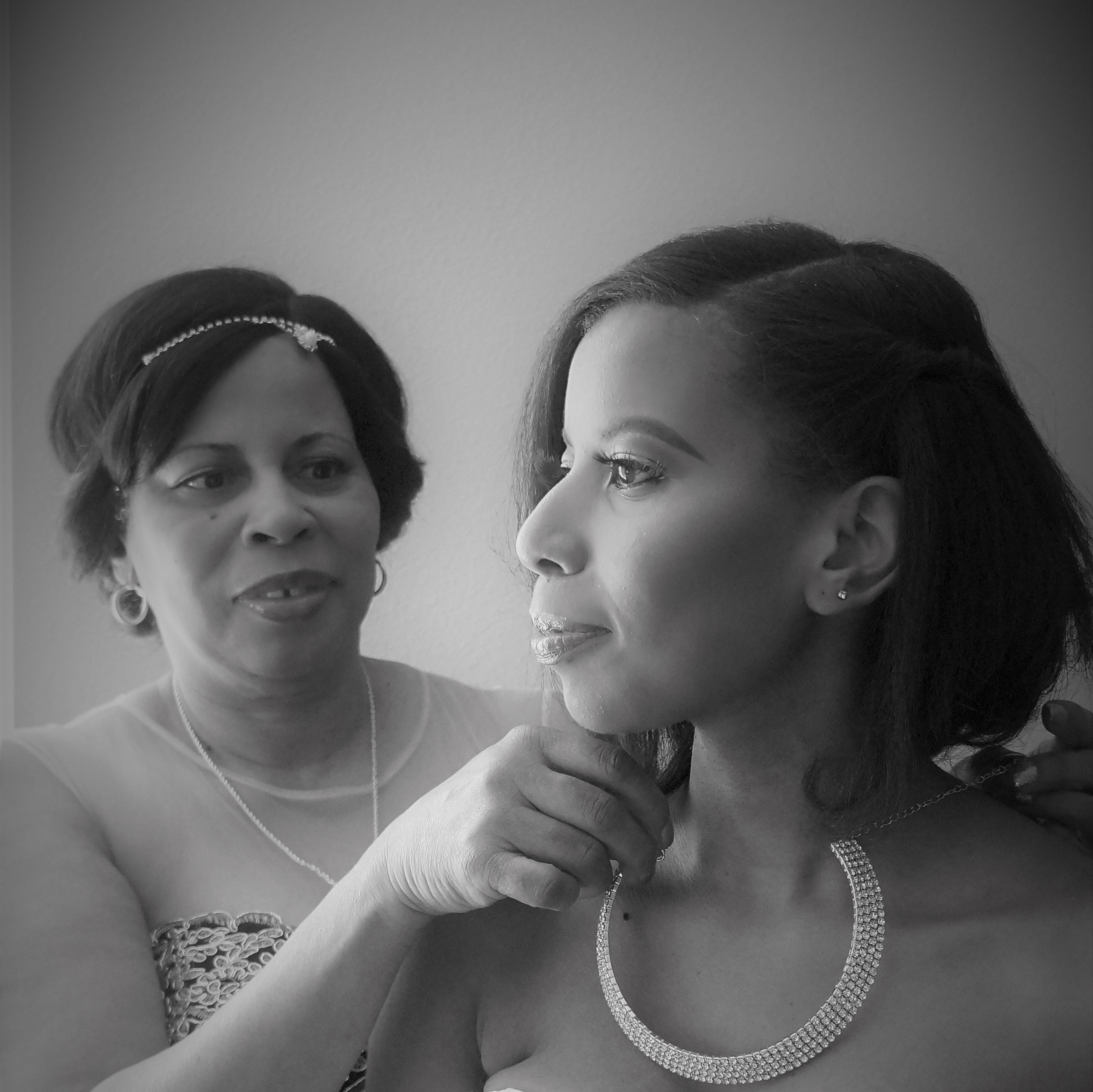 Mother of the Bride helping get the Bride ready