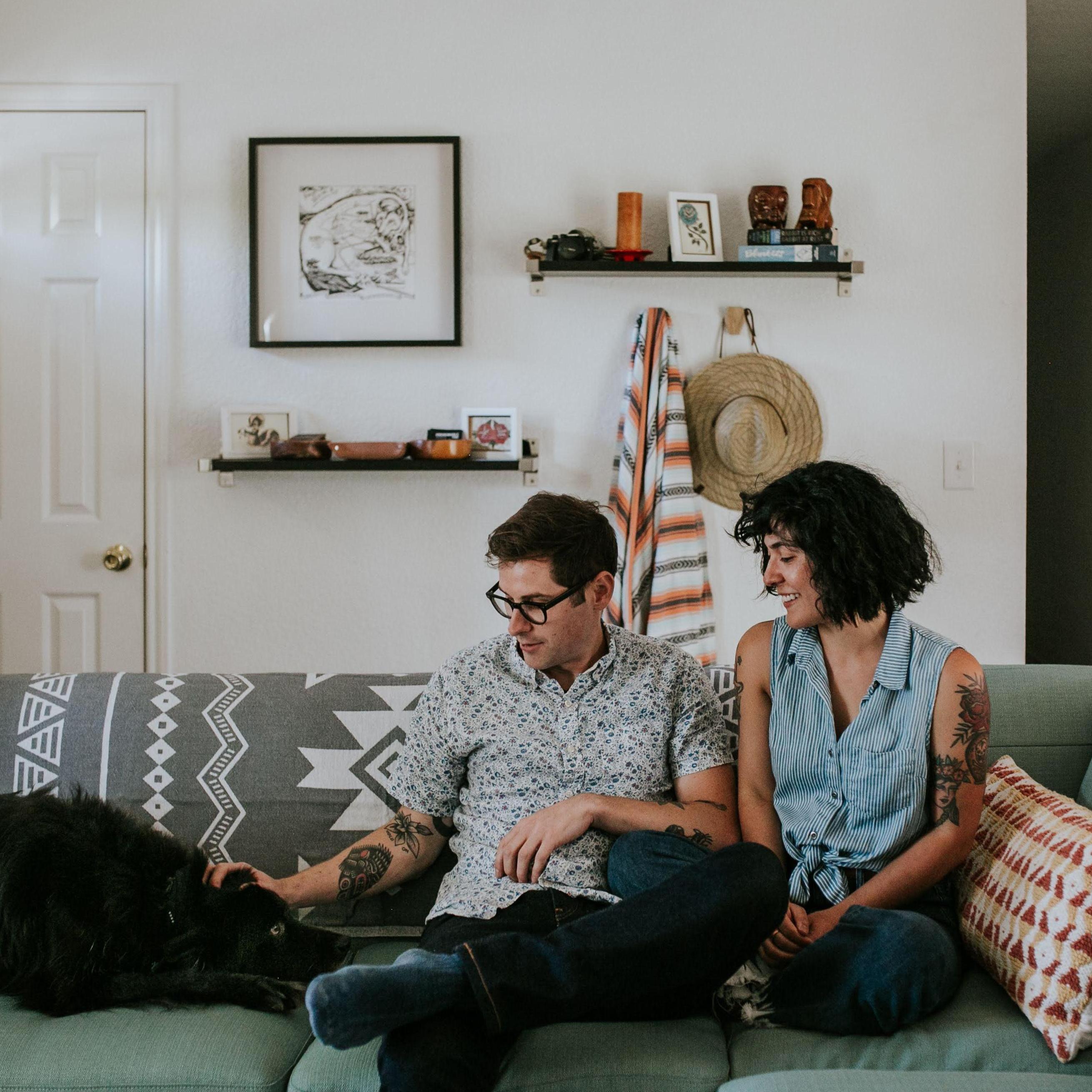 Townes is clearly not supposed to be on the couch. Very uncomfortable family photo [for Townes].
