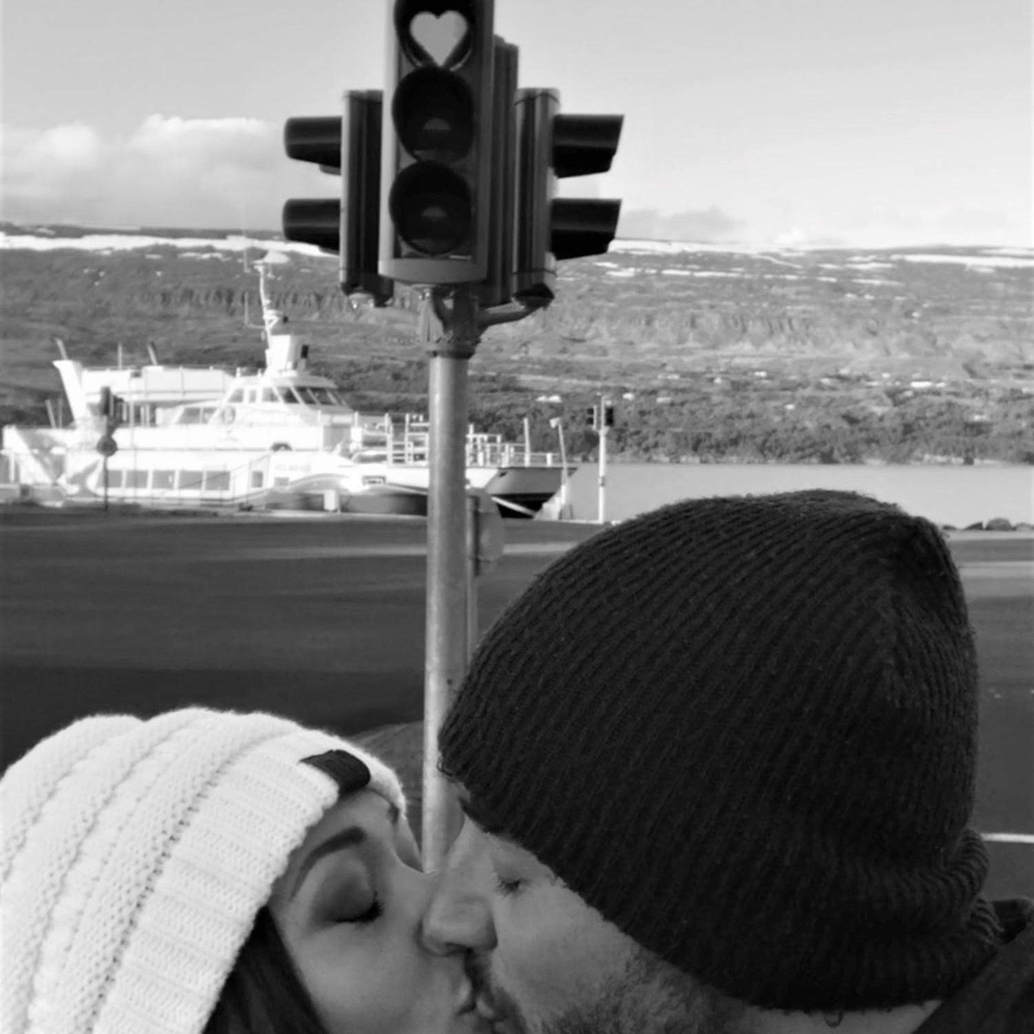 Stole a kiss in front of this stoplight in Akureyri, Iceland where all the red lights are shaped like hearts!