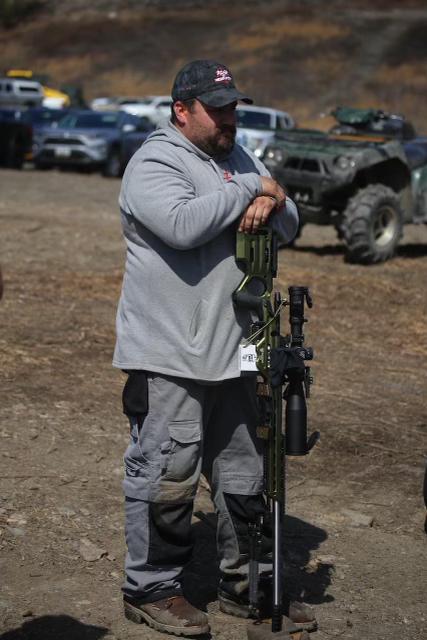 Greg at a match, he prefers his guns